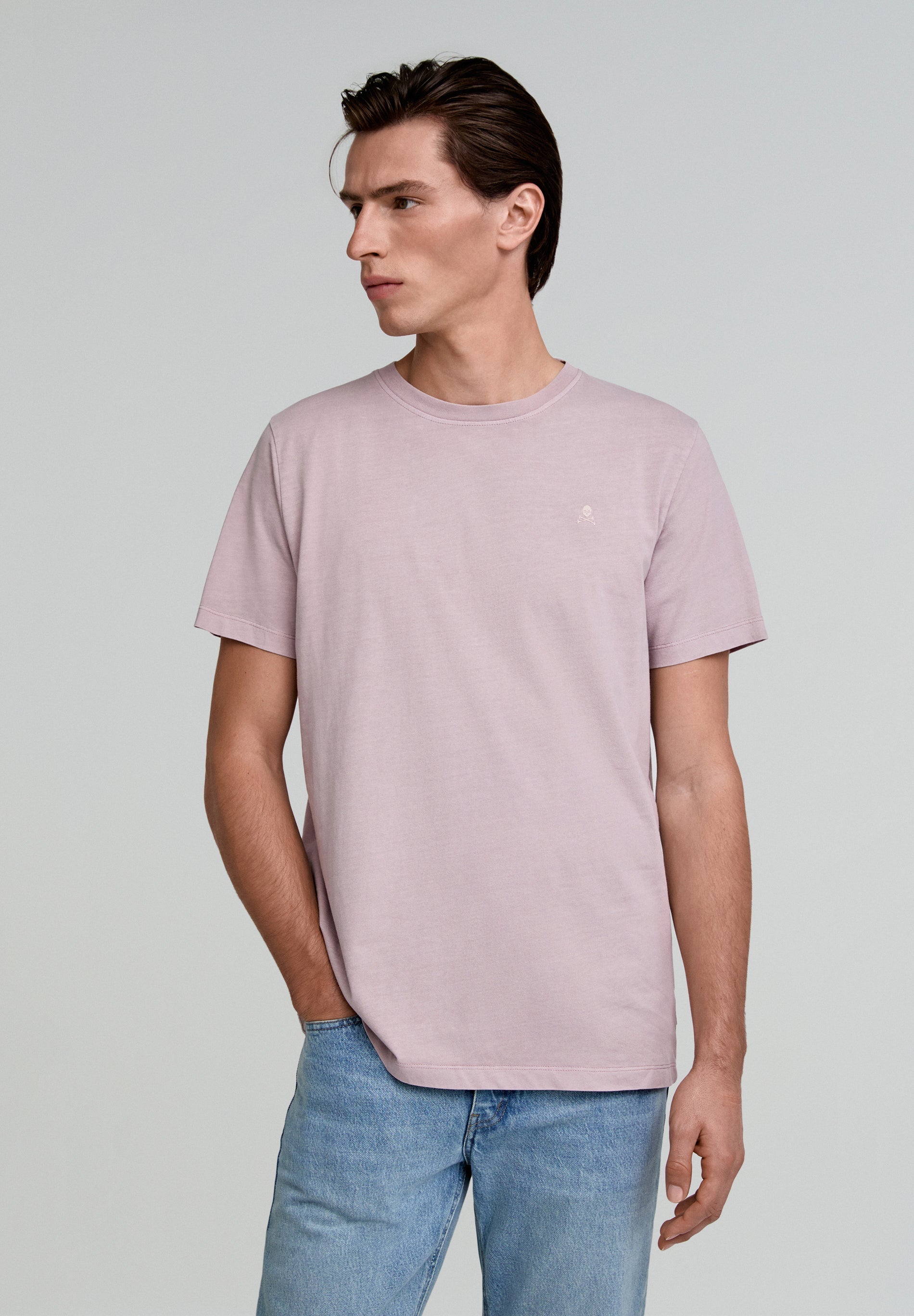 T-SHIRT DESBOTADA COM SKULL BORDADA