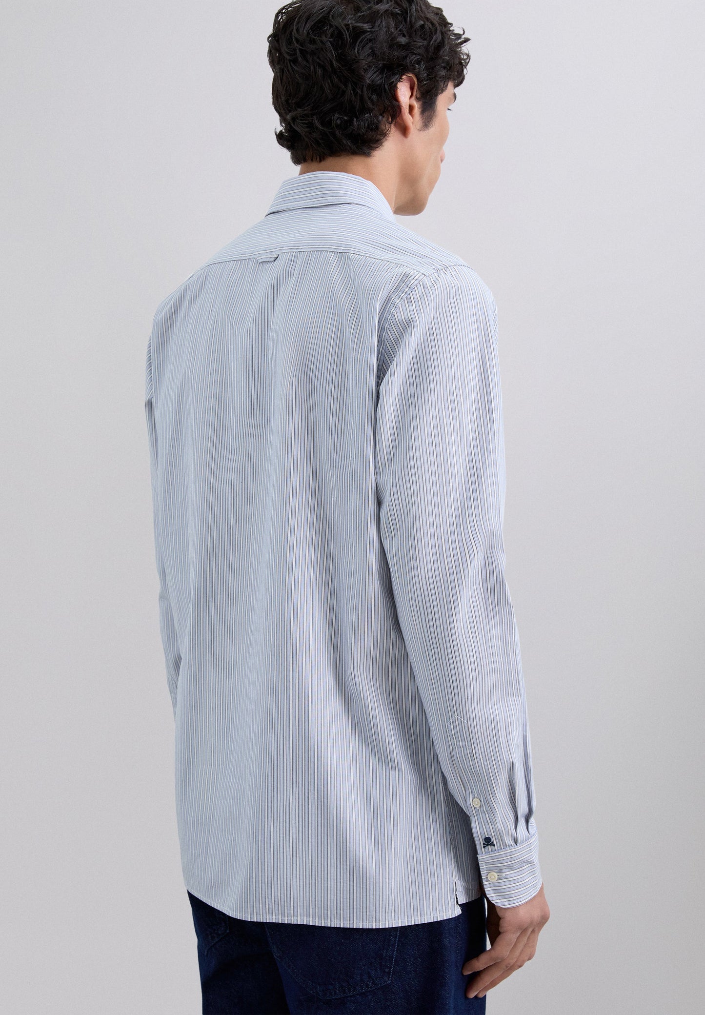 CAMISA ÀS RISCAS COM SKULL