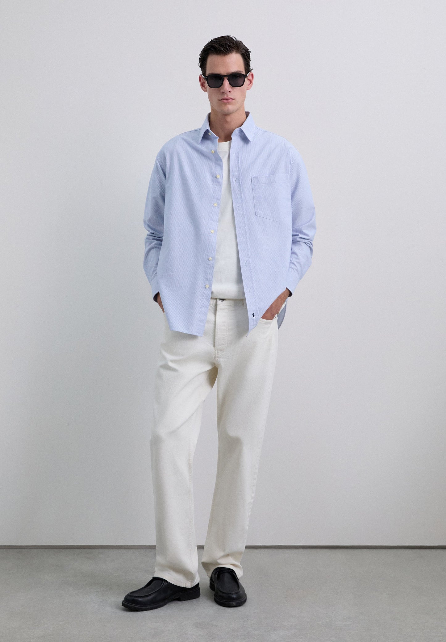 CAMISA ÀS RISCAS COM SKULL