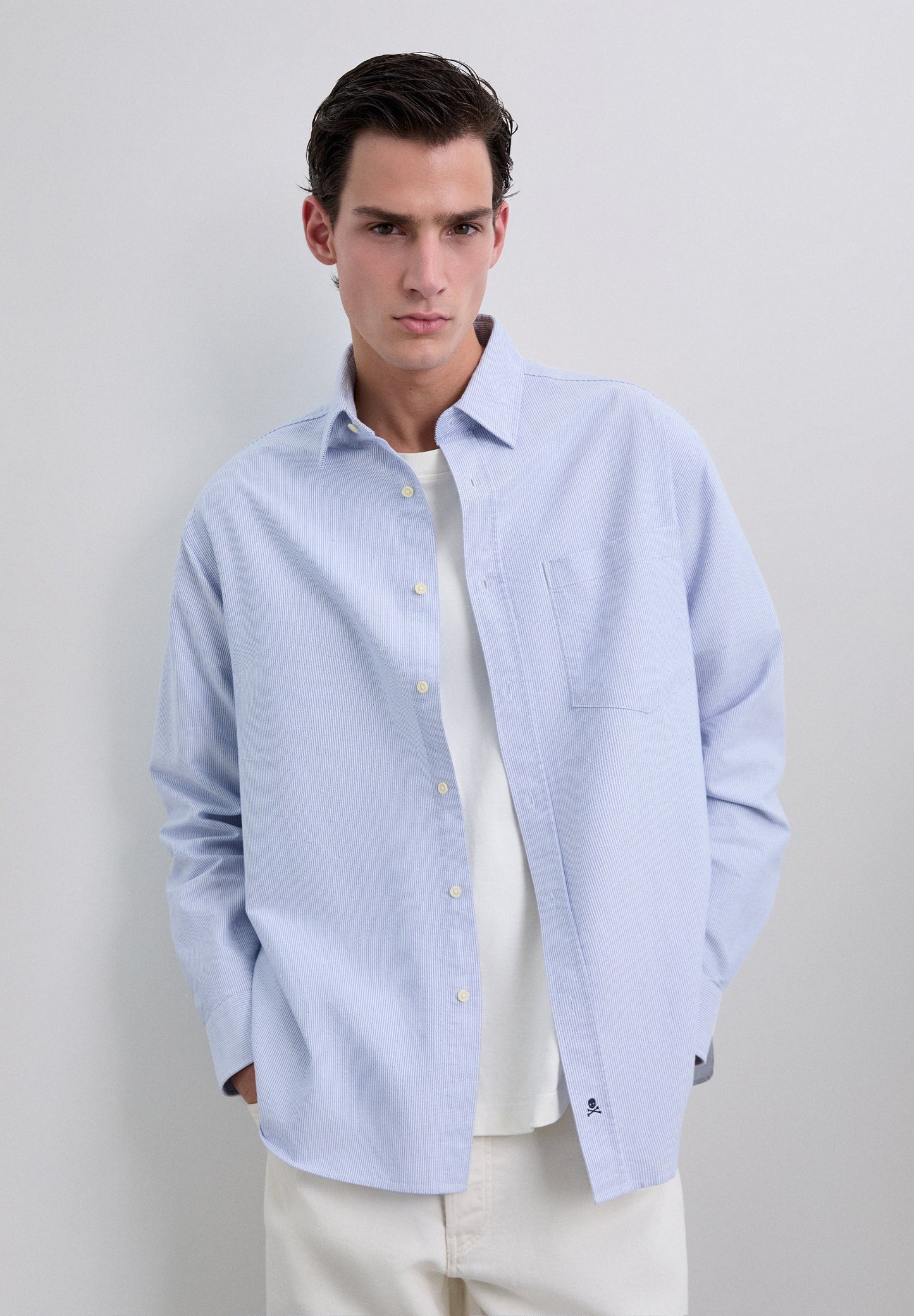 CAMISA ÀS RISCAS COM SKULL