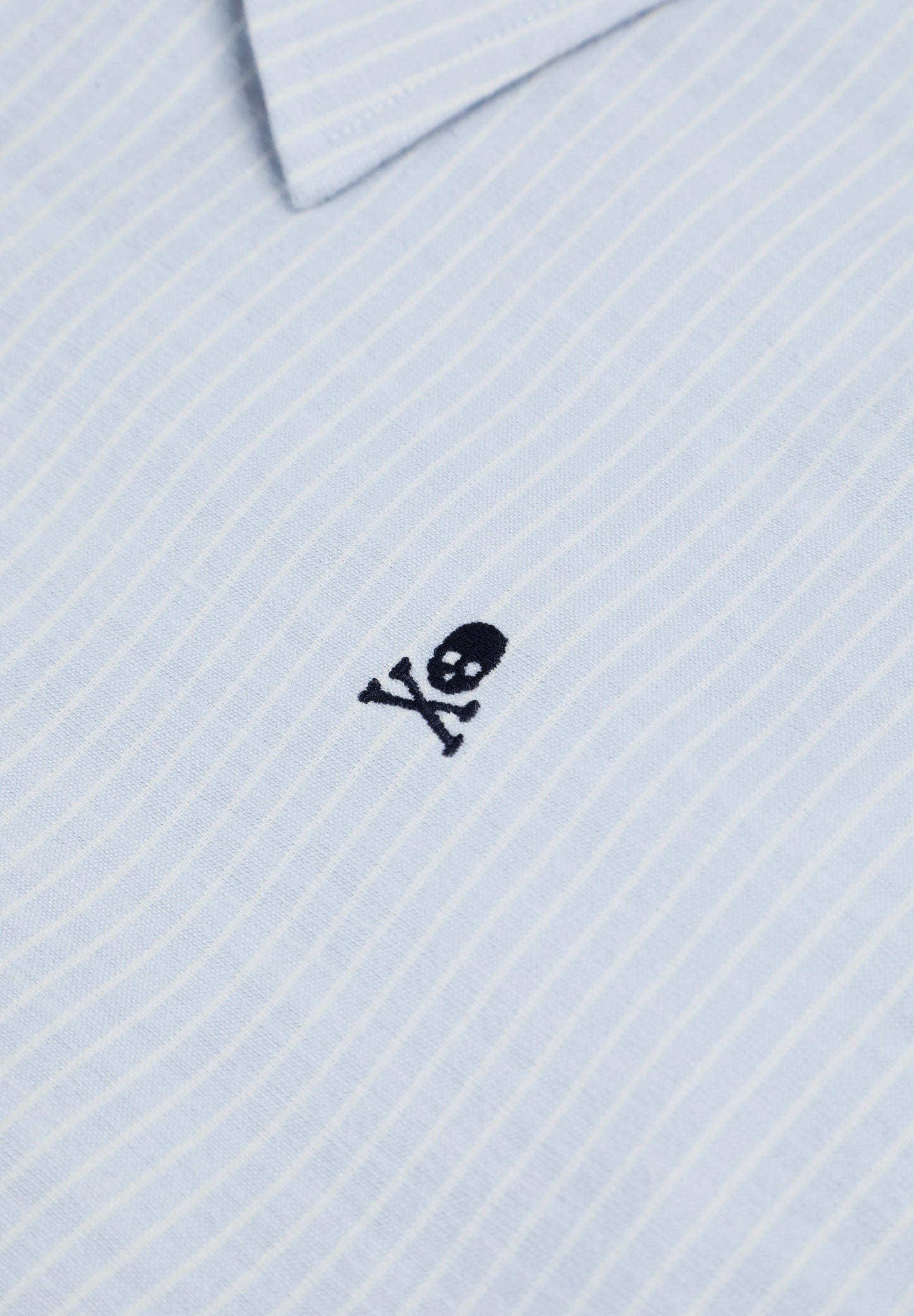 CAMISA ÀS RISCAS COM SKULL