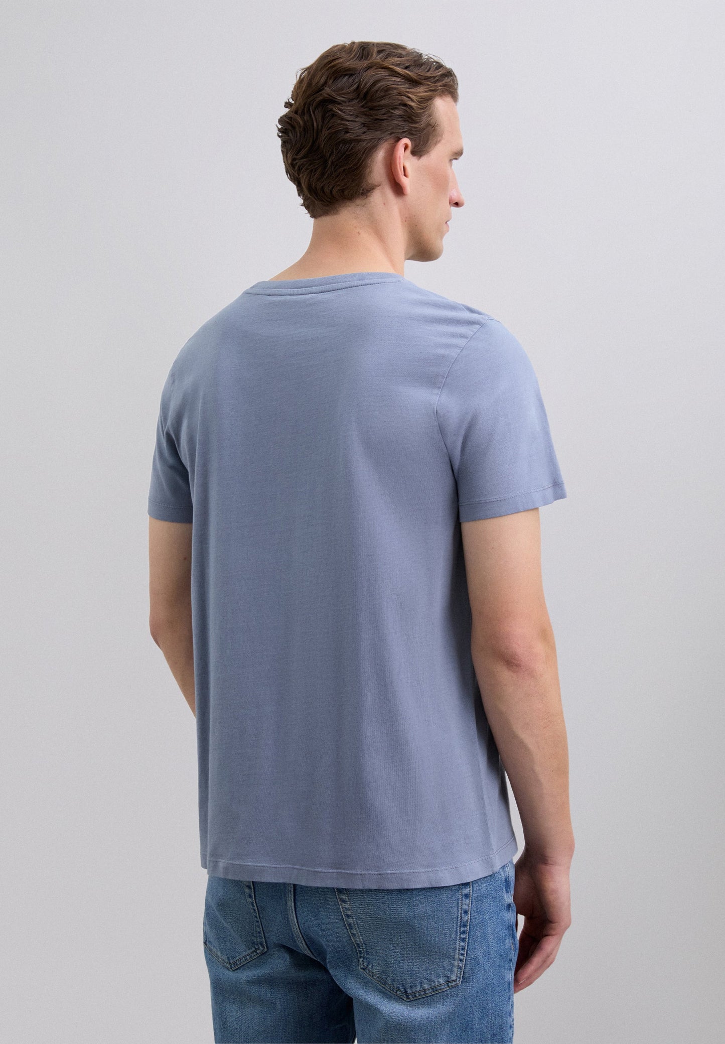 T-SHIRT COM SKULL BORDADA NO TOM