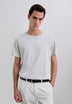 T-SHIRT COM SKULL BORDADA NO TOM