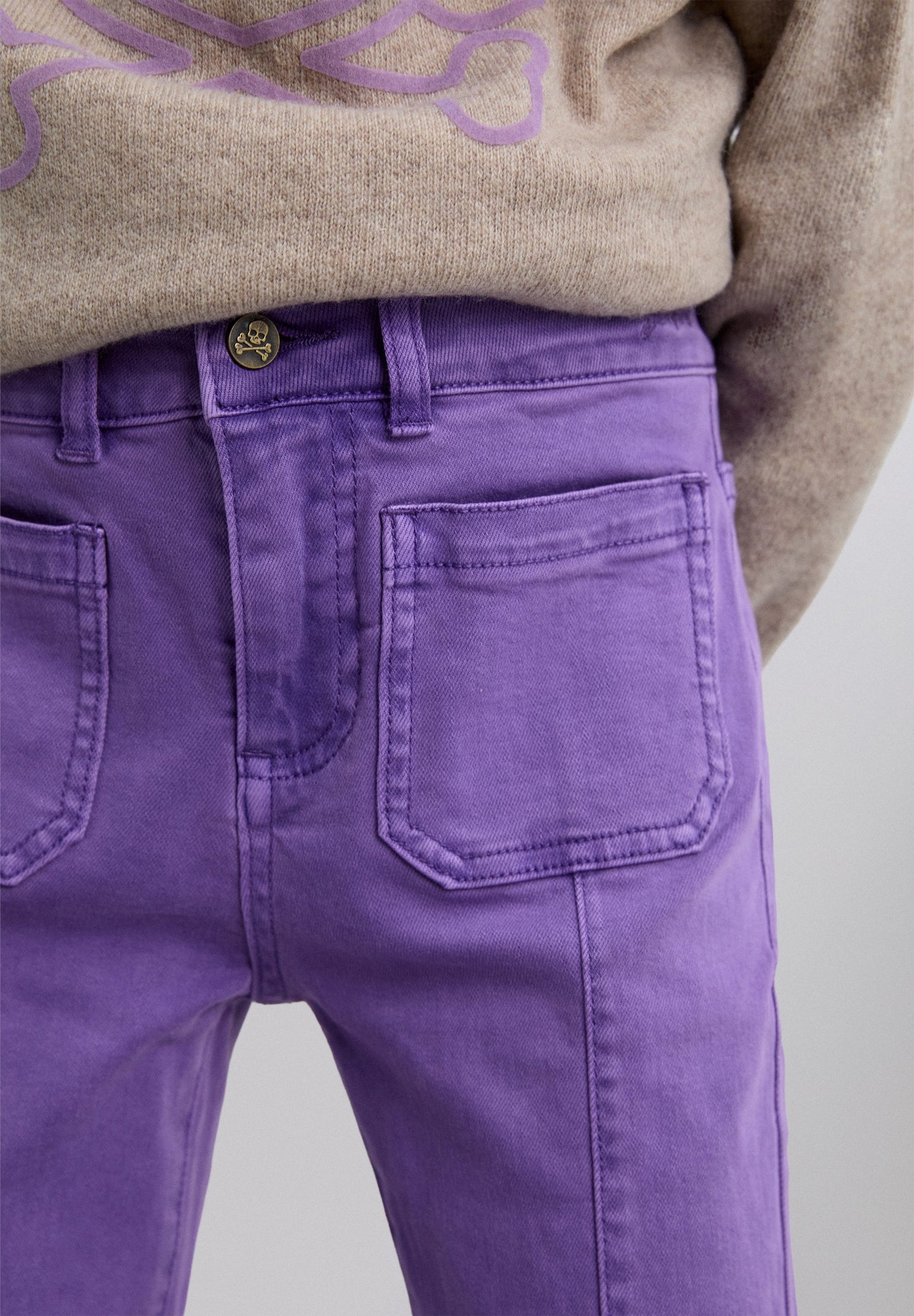 CALÇAS BOCA DE SINO COM FRANJAS