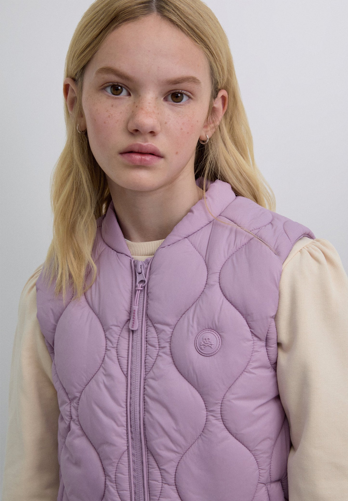 COLETE ACOLCHOADO COM SKULL