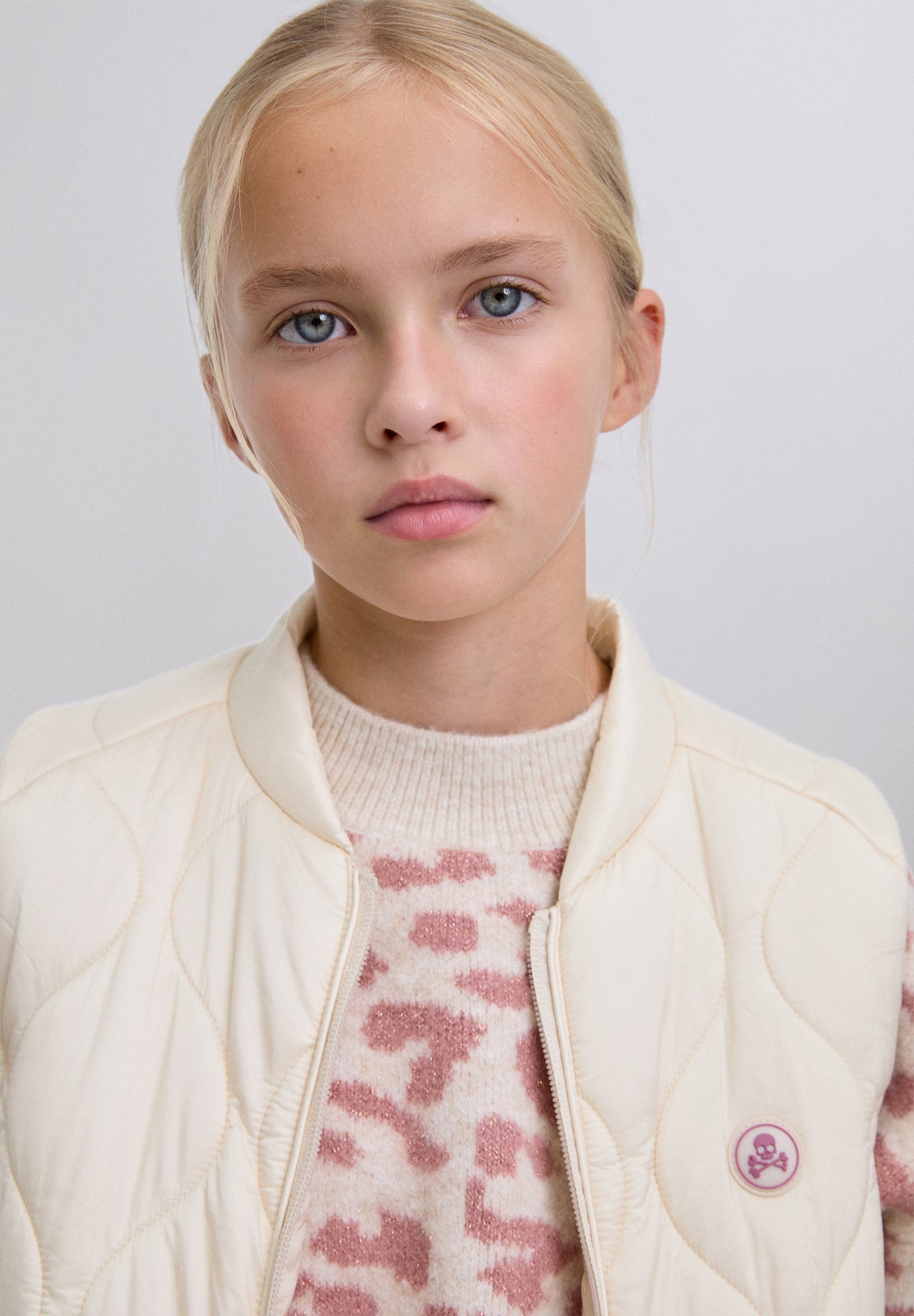 COLETE ACOLCHOADO COM SKULL