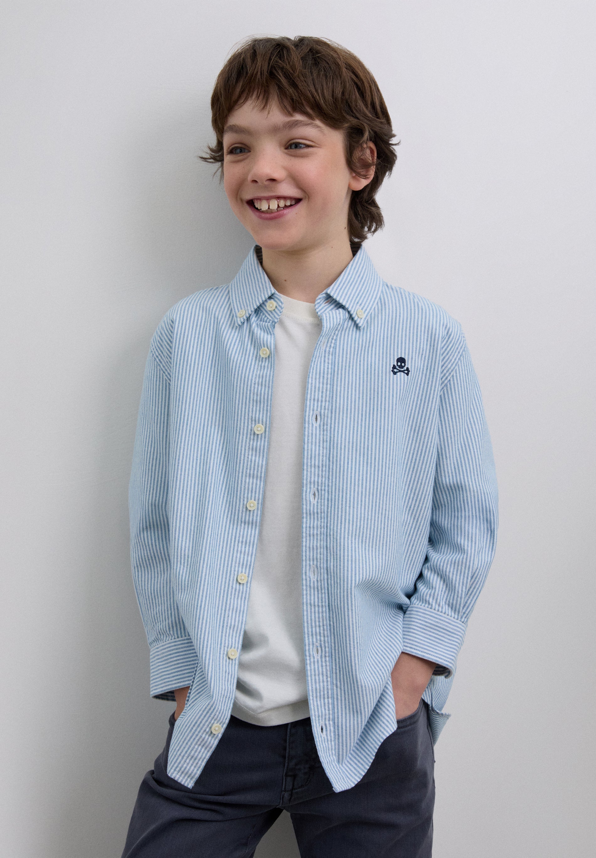 CAMISA ÀS RISCAS COM SKULL