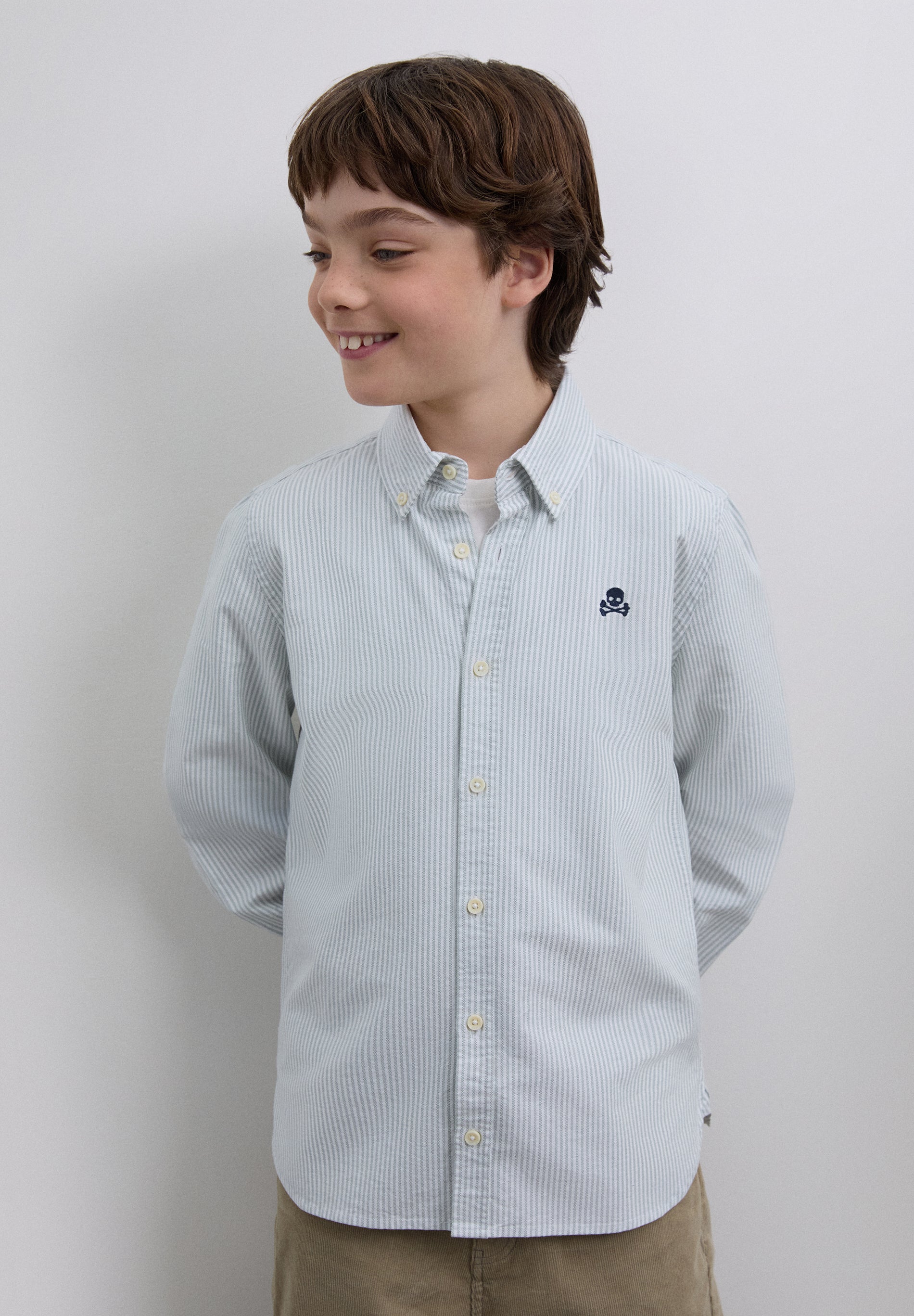 CAMISA ÀS RISCAS COM SKULL