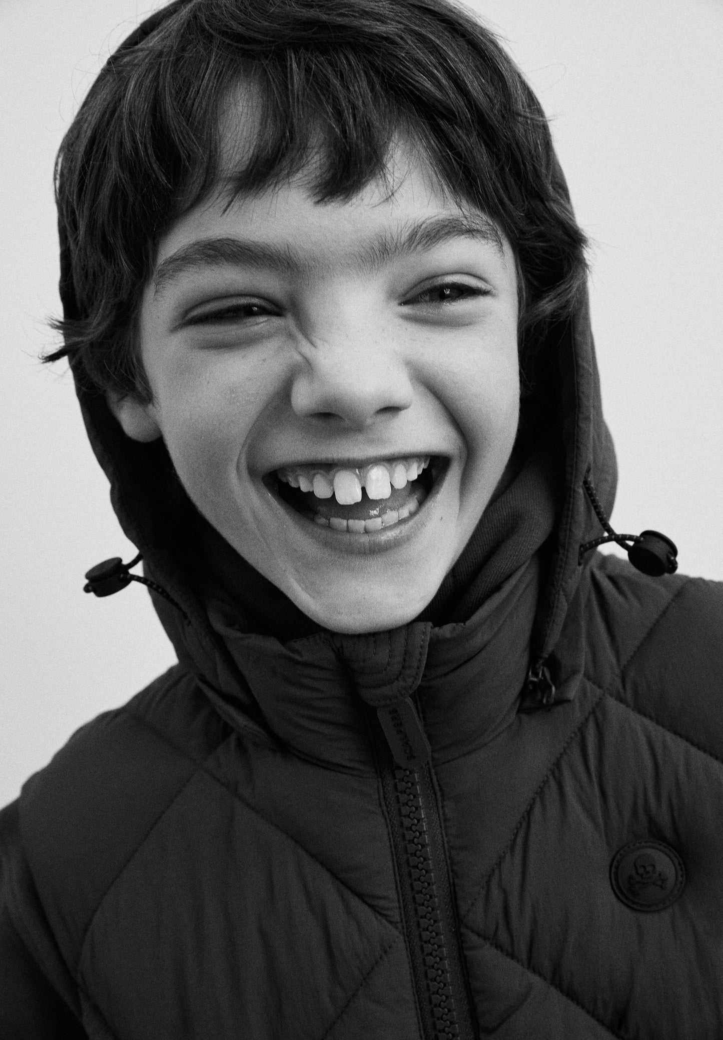 COLETE ACOLCHOADO COM CAPUZ SKULL