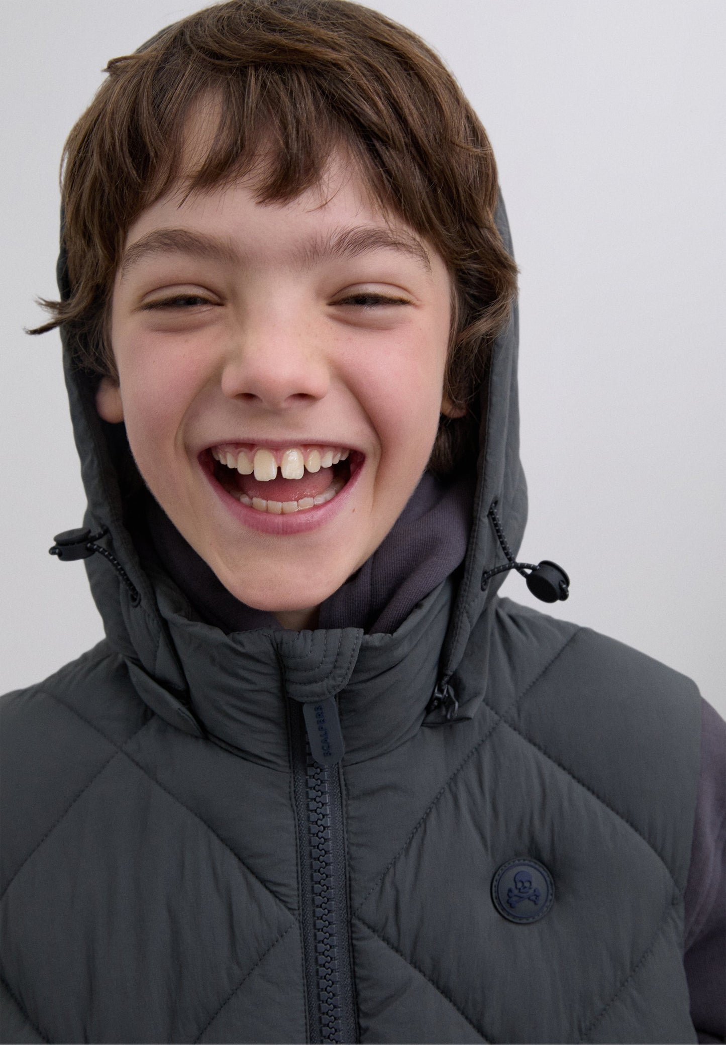 COLETE ACOLCHOADO COM CAPUZ SKULL