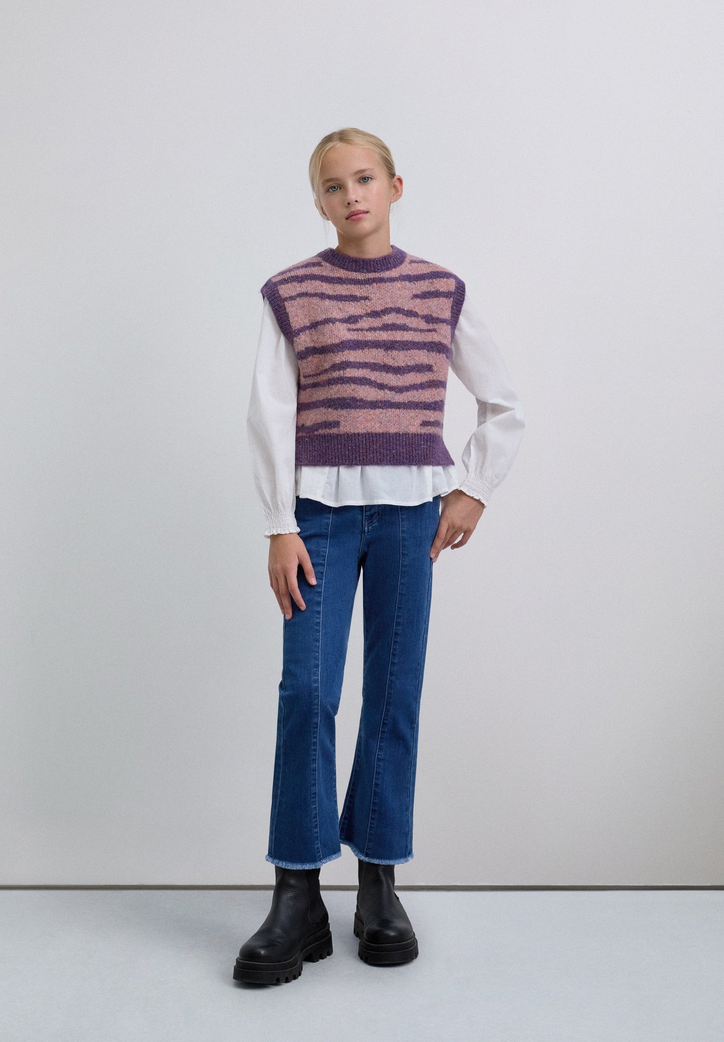 COLETE EM MALHA COM ESTAMPADO ANIMAL