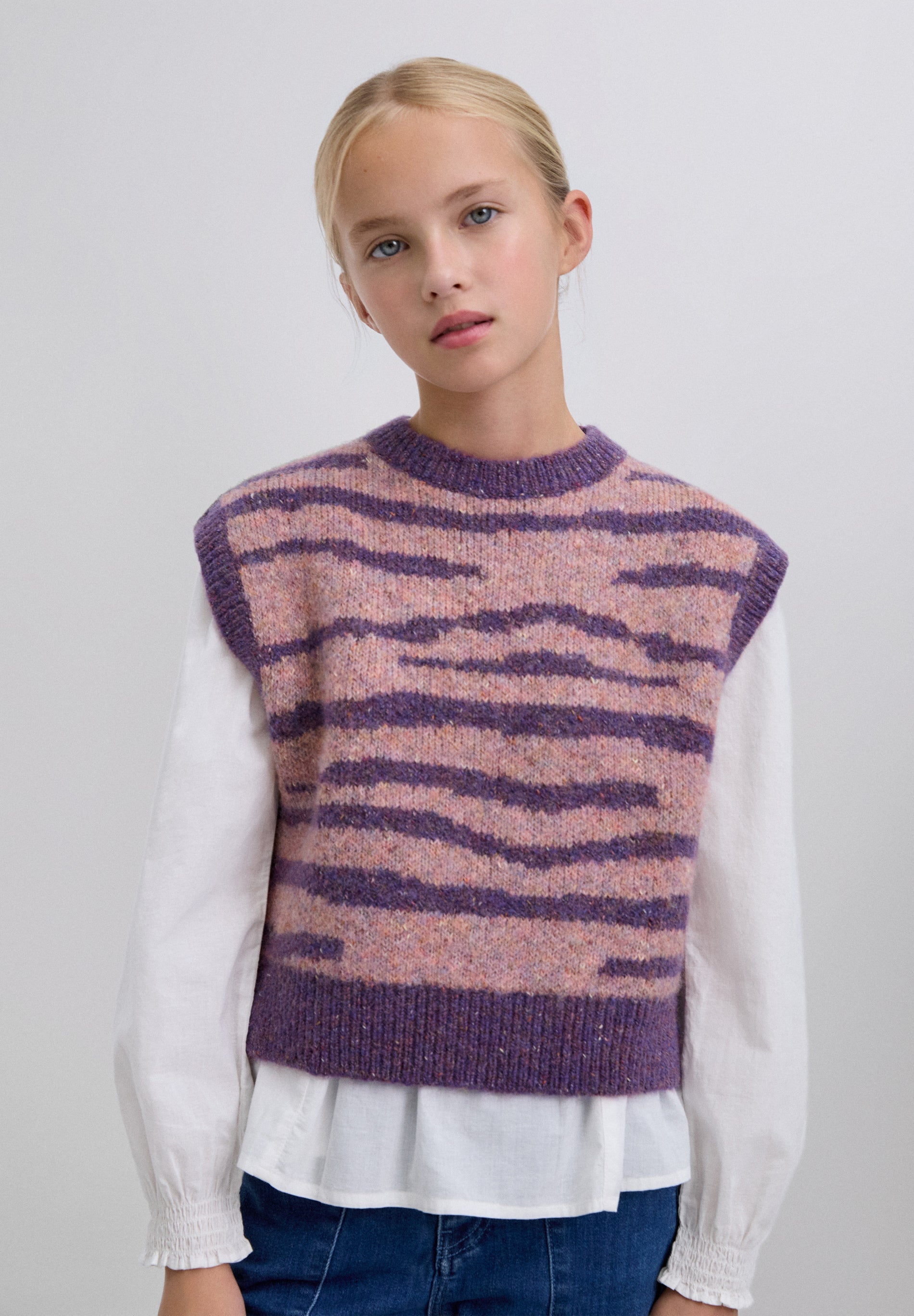 COLETE EM MALHA COM ESTAMPADO ANIMAL