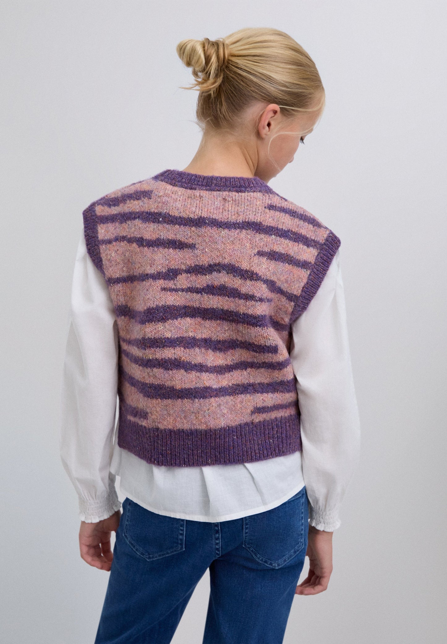 COLETE EM MALHA COM ESTAMPADO ANIMAL