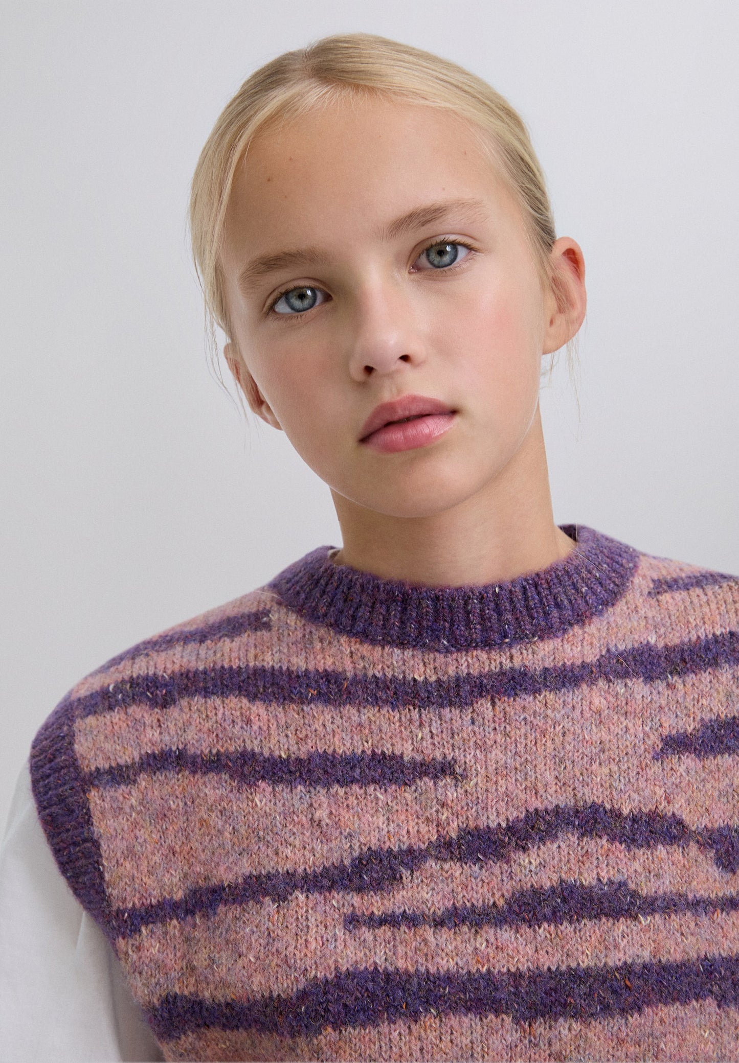 COLETE EM MALHA COM ESTAMPADO ANIMAL