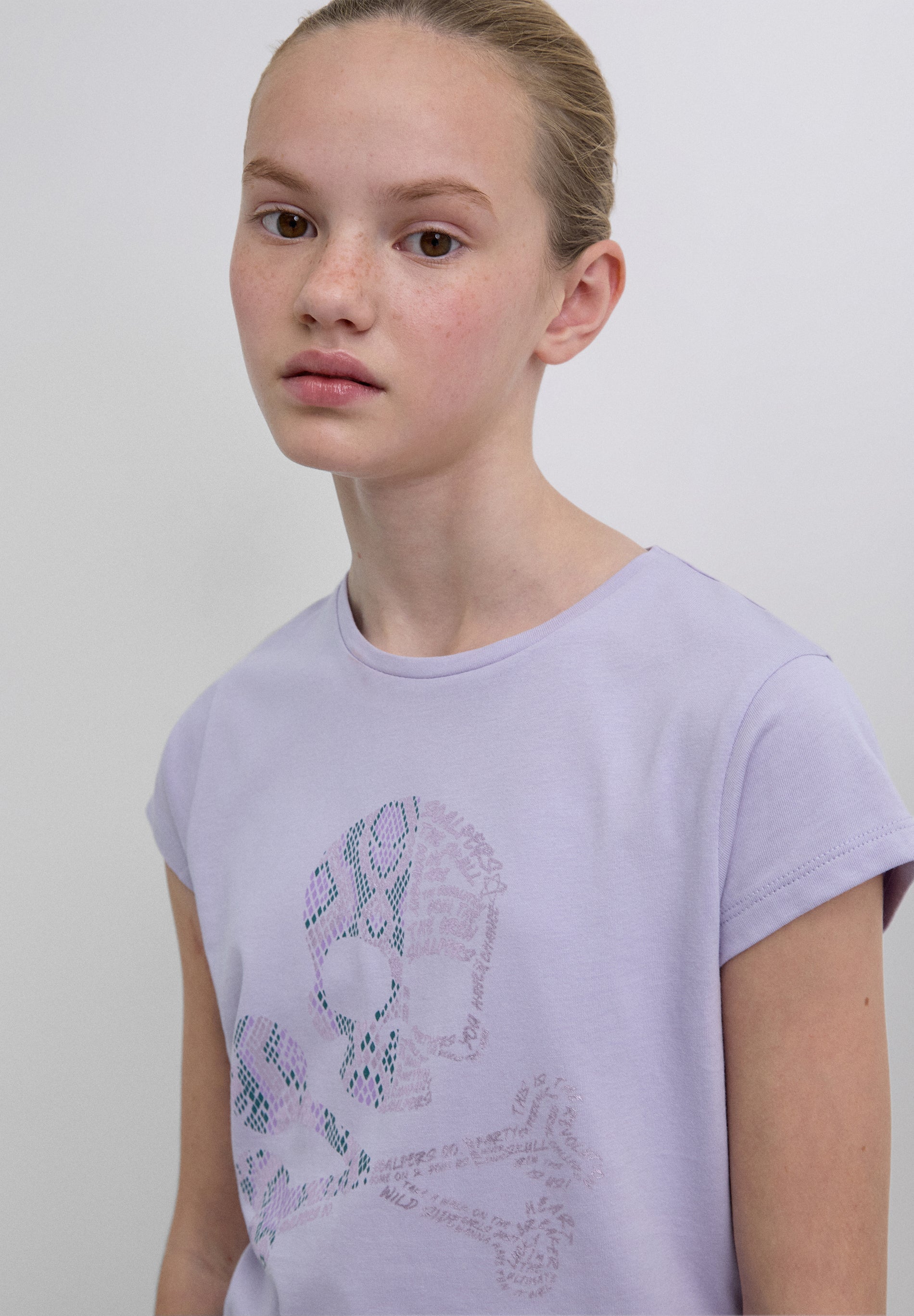 T-SHIRT COM DUPLO ESTAMPADO ANIMAL