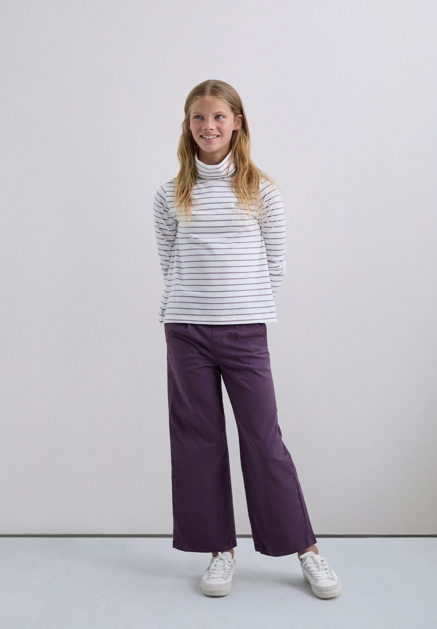 T-SHIRT ÀS RISCAS DE MANGA COMPRIDA