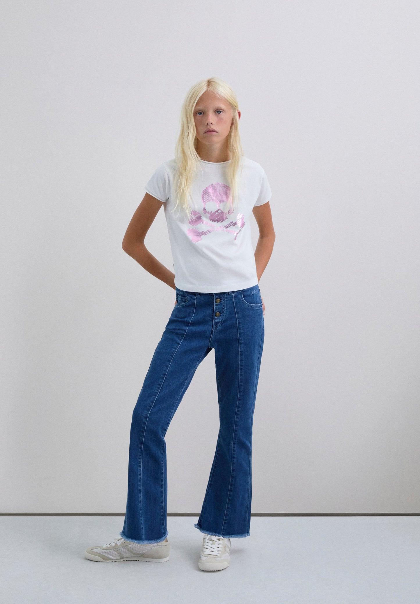 T-SHIRT COM PADRÃO METALIZADO