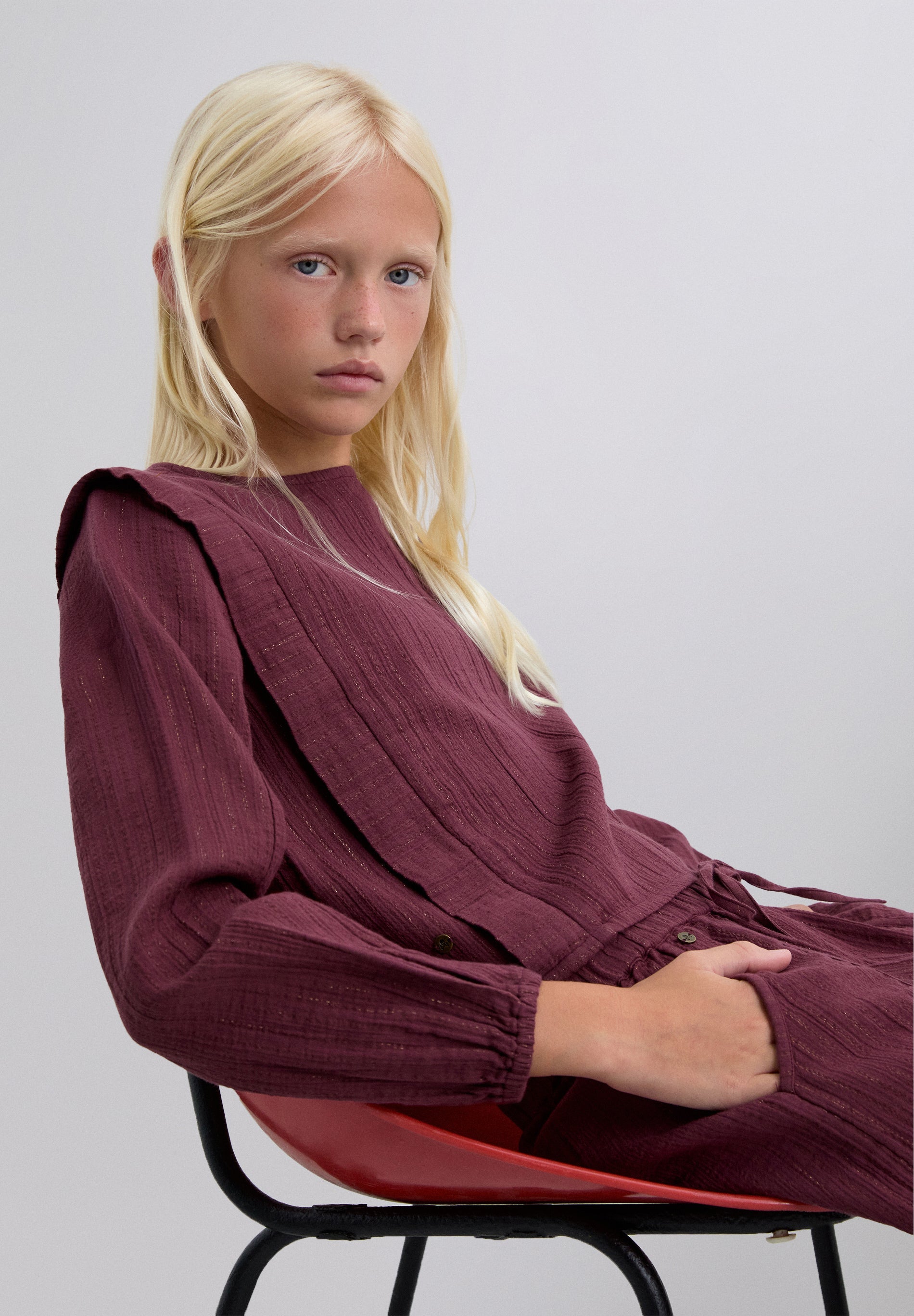BLUSA COM PREGAS