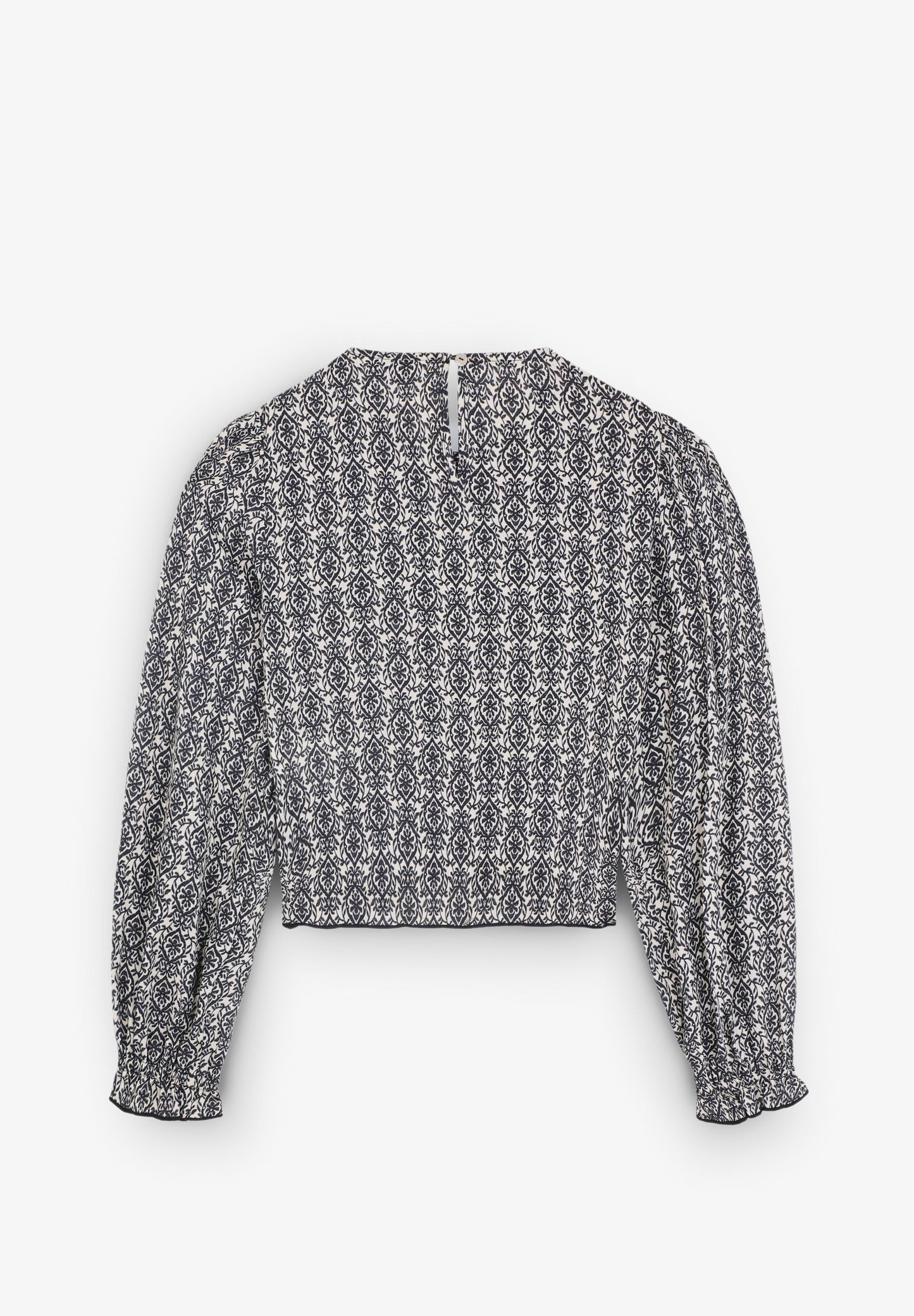 BLUSA COM PADRÃO E FOLHO