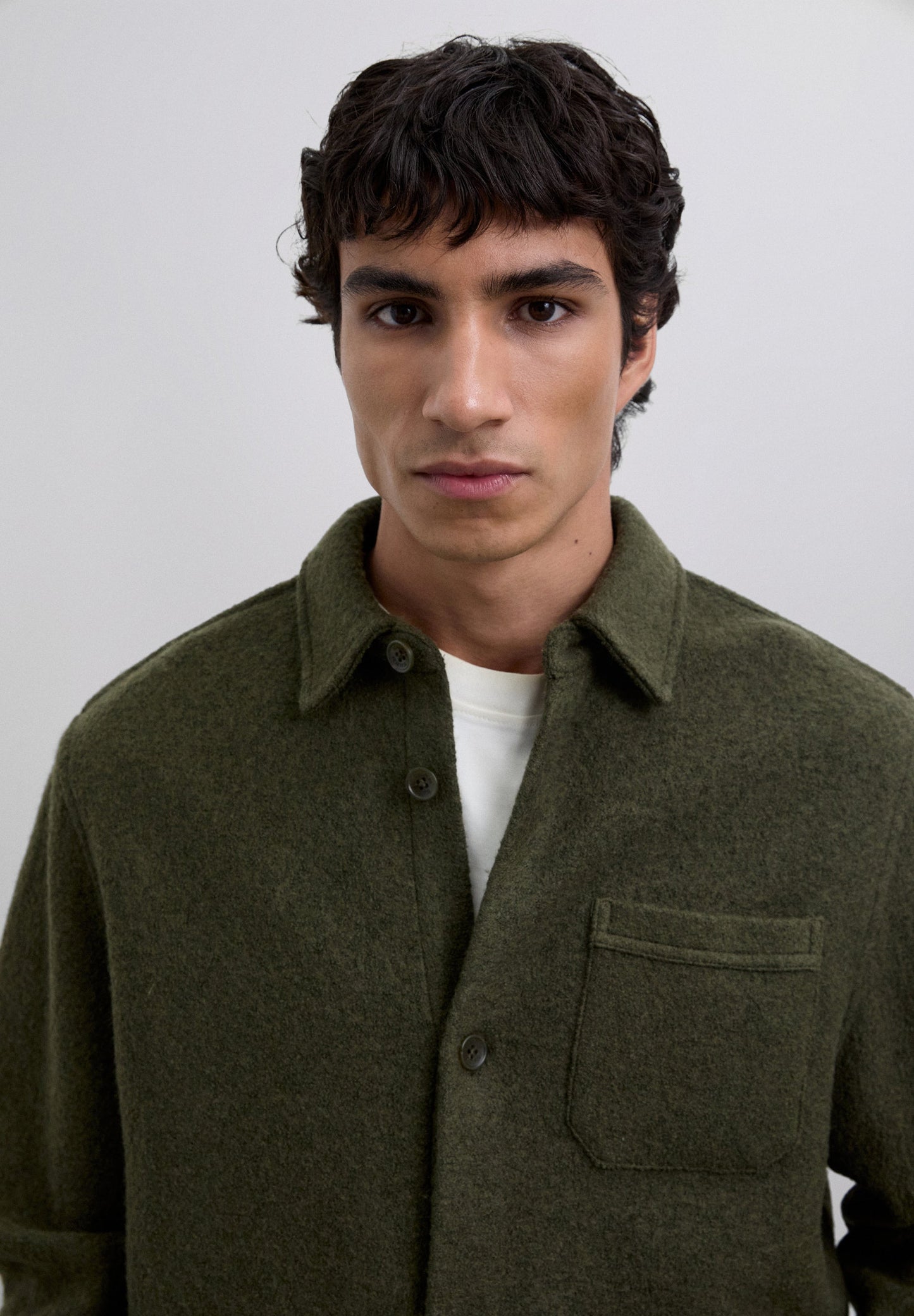 CAMISA COMPRIDA EM LÃ COM BOLSOS