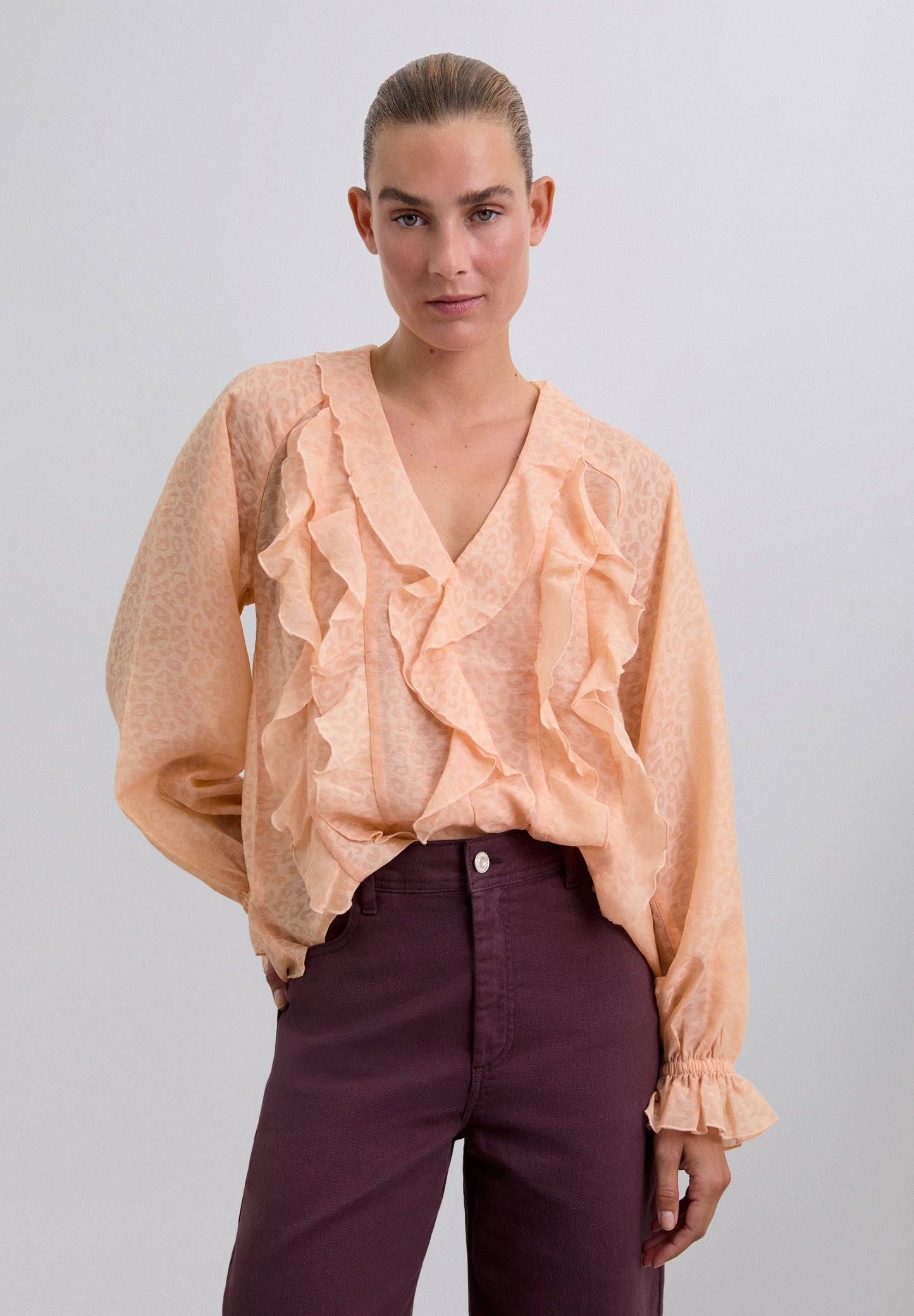 BLUSA COM FOLHOS ESTAMPADO ANIMAL