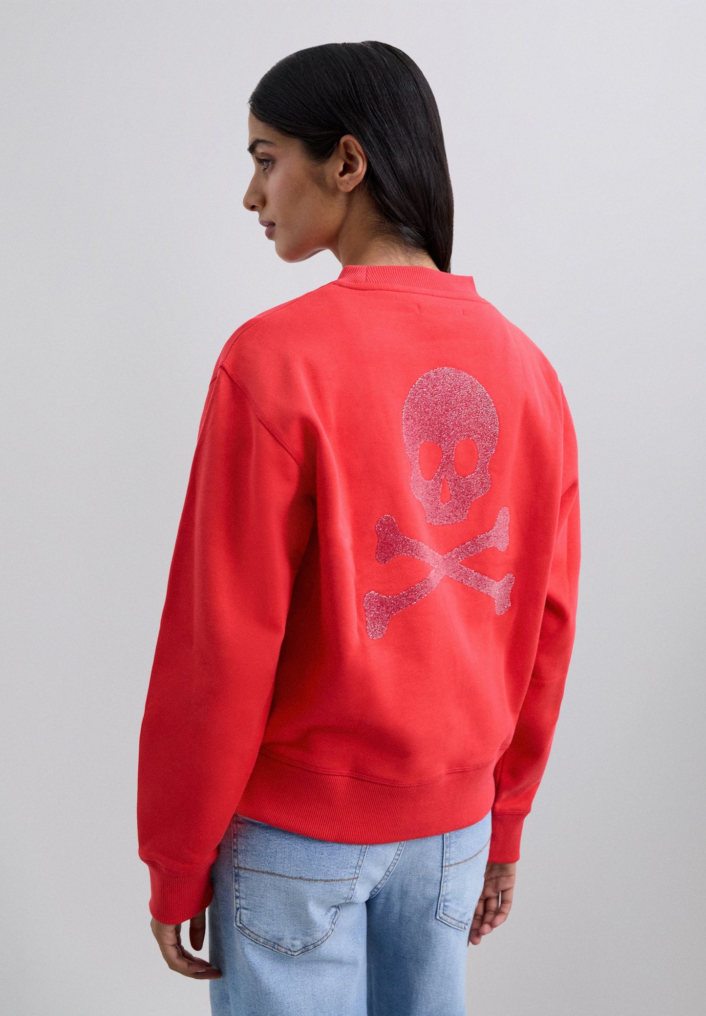 SWEATSHIRT COM SKULL ATRÁS EM GLITTER