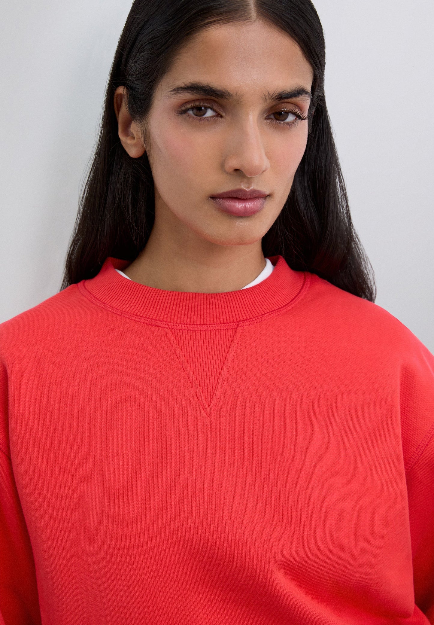 SWEATSHIRT COM SKULL ATRÁS EM GLITTER