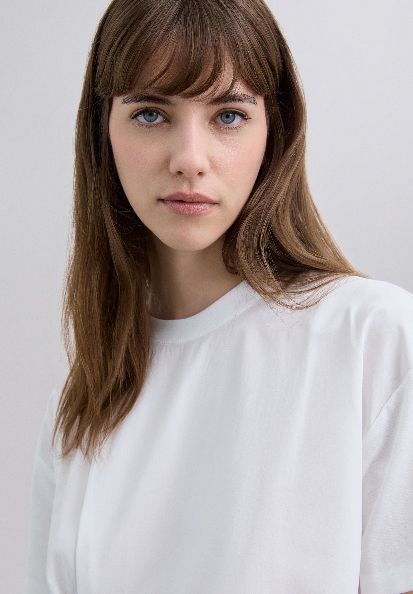 T-SHIRT ASSIMÉTRICA DE DECOTE REDONDO