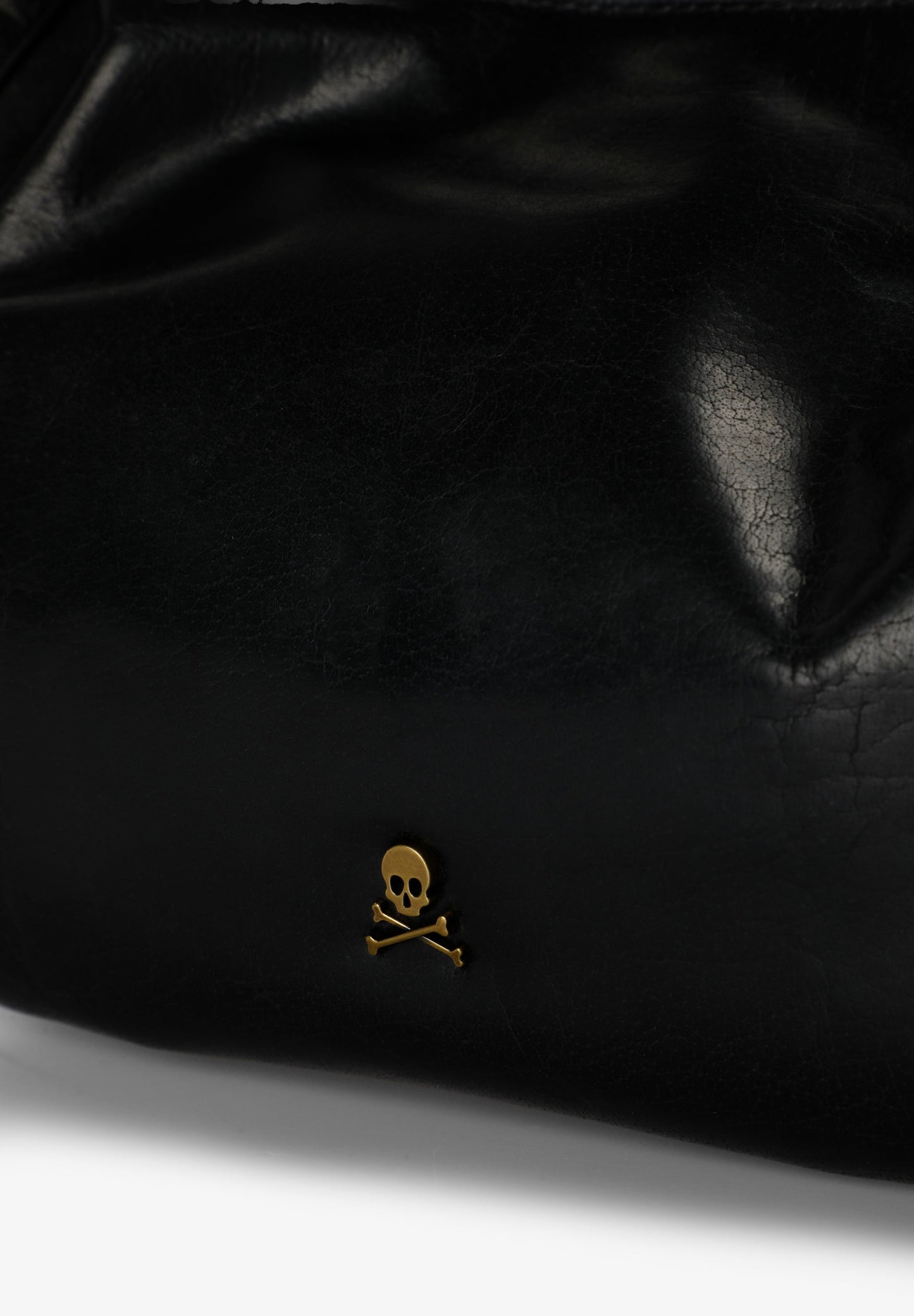 BOLSA MINI EM PELE COM ALÇA TRANÇADA