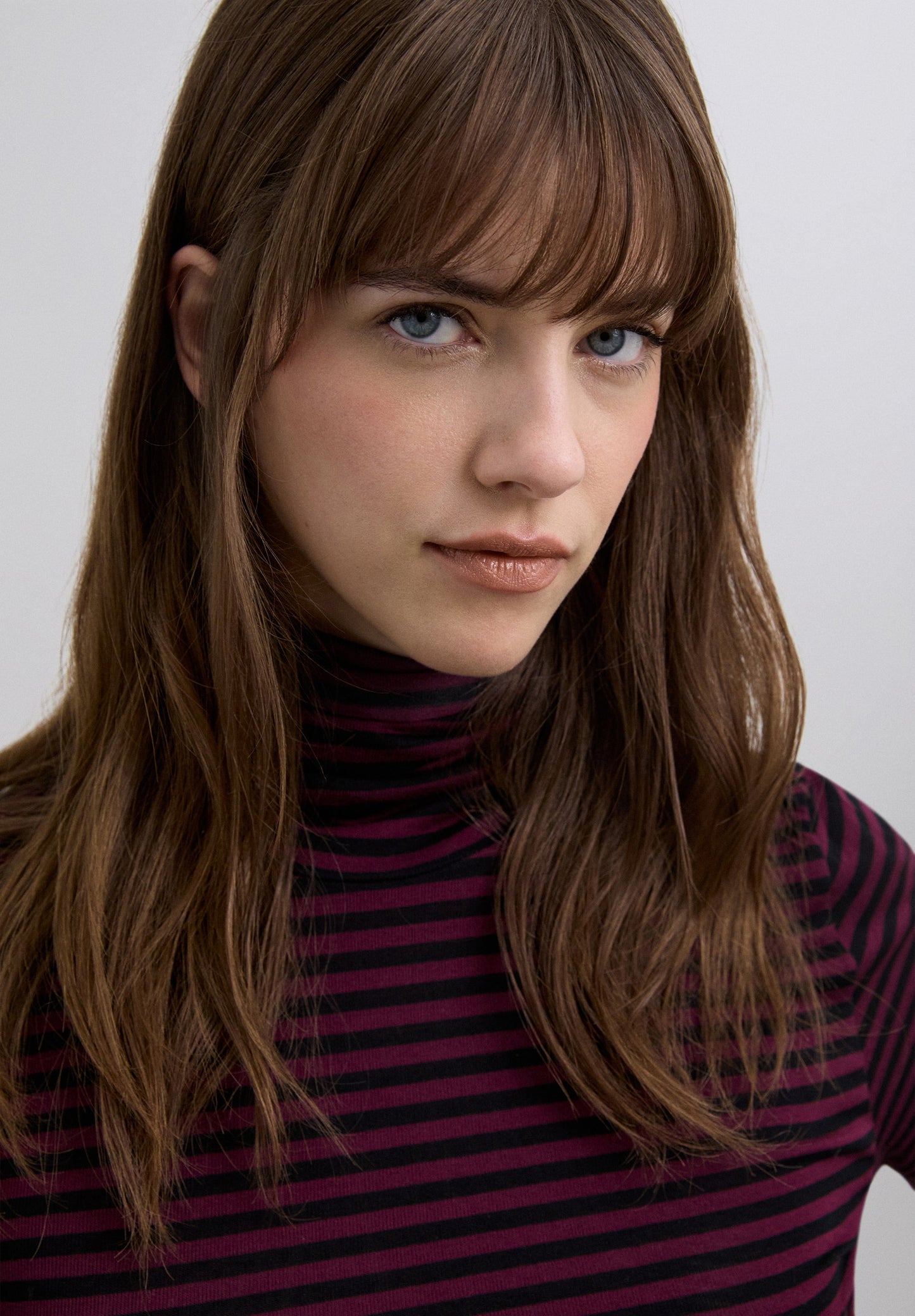 T-SHIRT ÀS RISCAS DE MANGA COMPRIDA