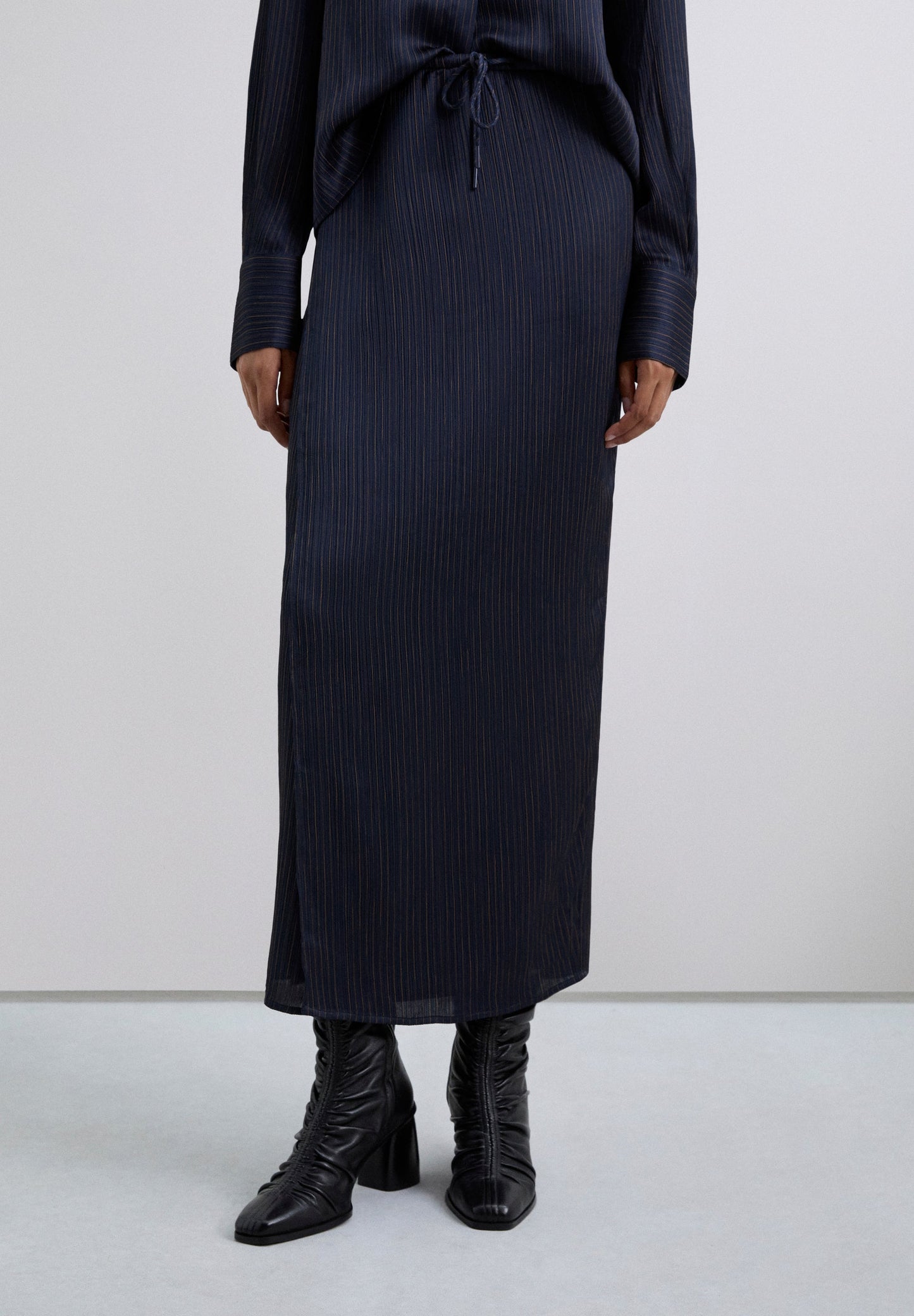 SAIA COMPRIDA ÀS RISCAS