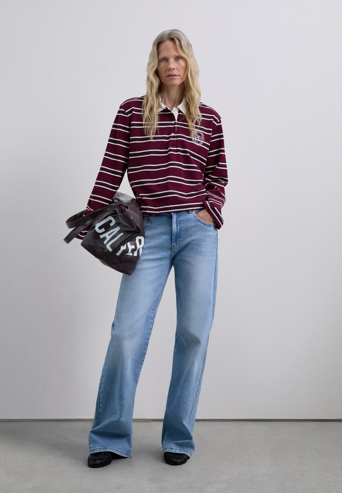 CAMISA POLO ÀS RISCAS DE MANGA COMPRIDA