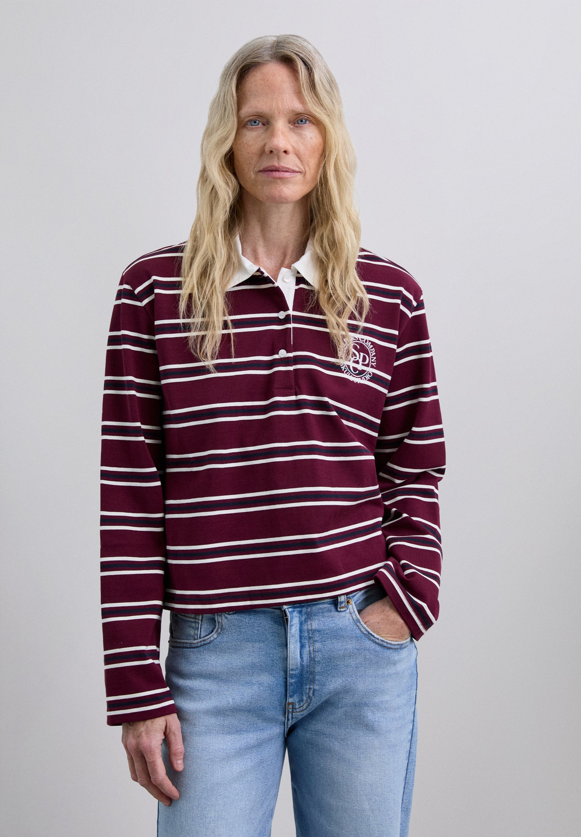 CAMISA POLO ÀS RISCAS DE MANGA COMPRIDA