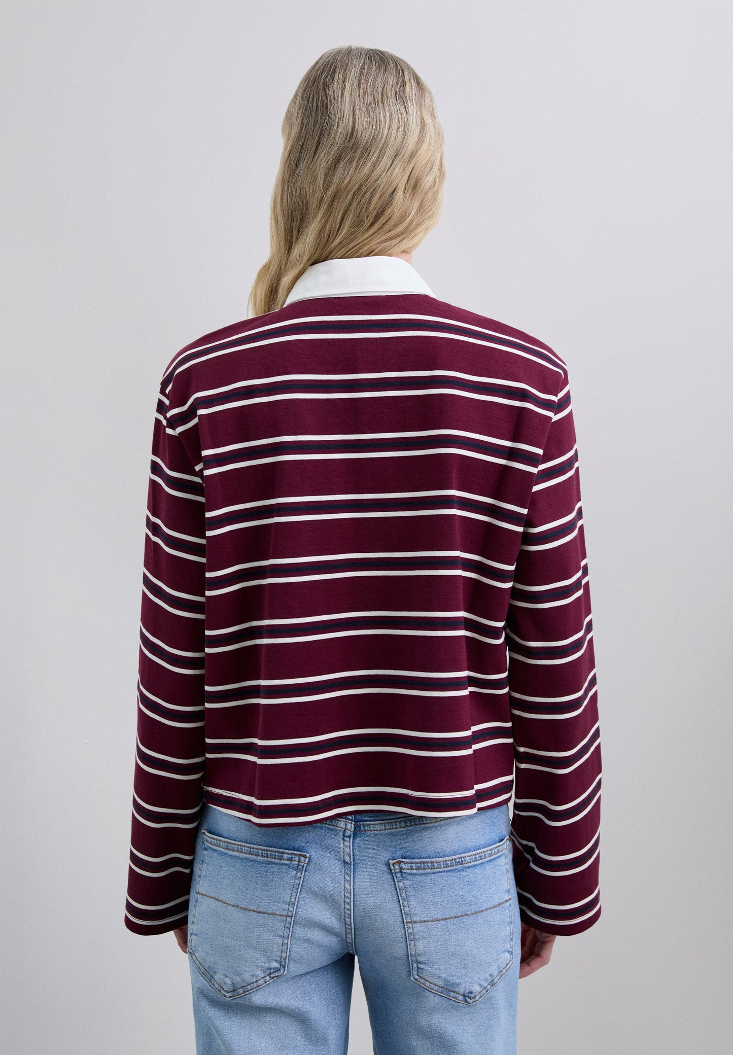 CAMISA POLO ÀS RISCAS DE MANGA COMPRIDA
