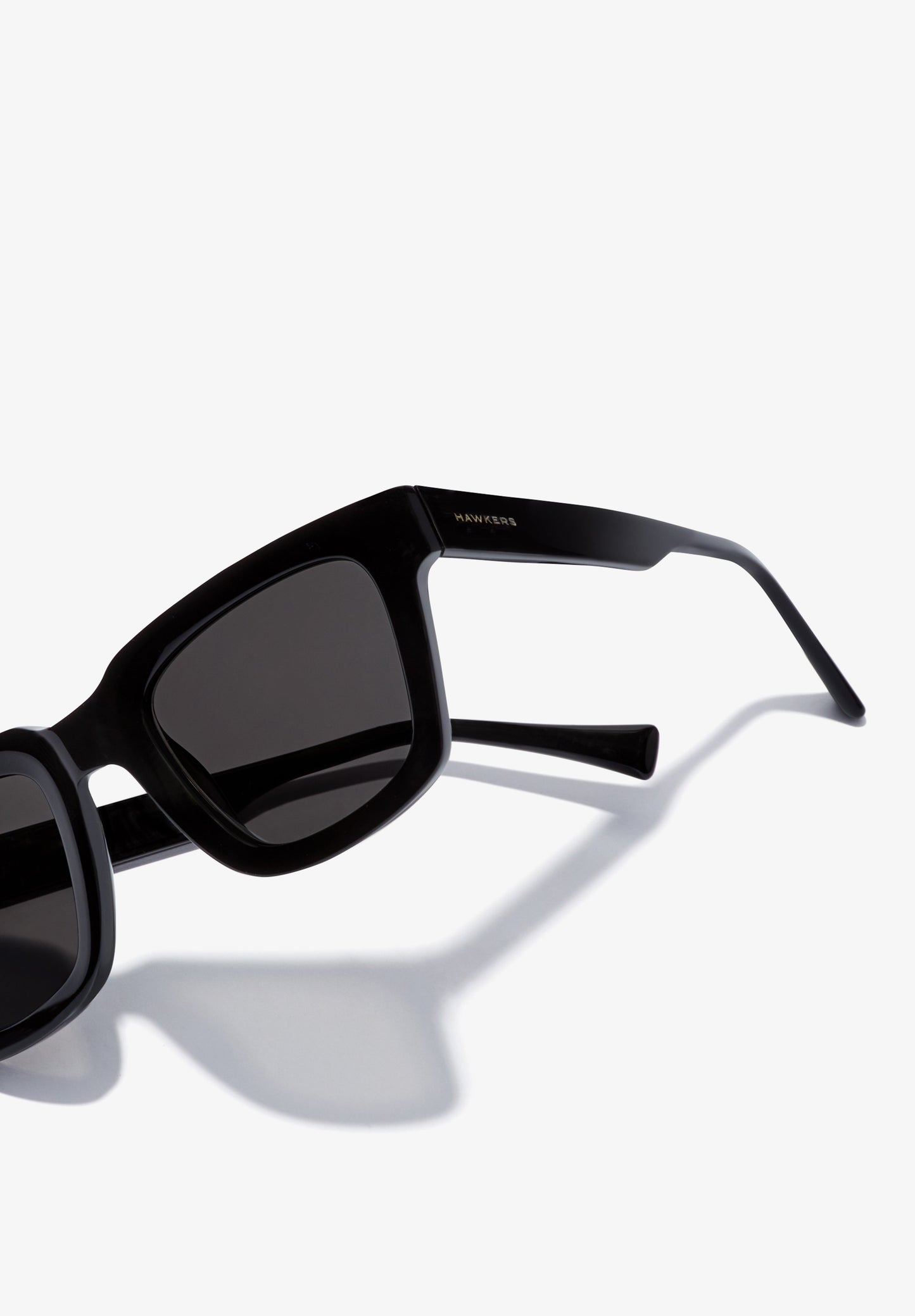 HAWKERS | ONE UPTOWN - POLARIZED BLACK