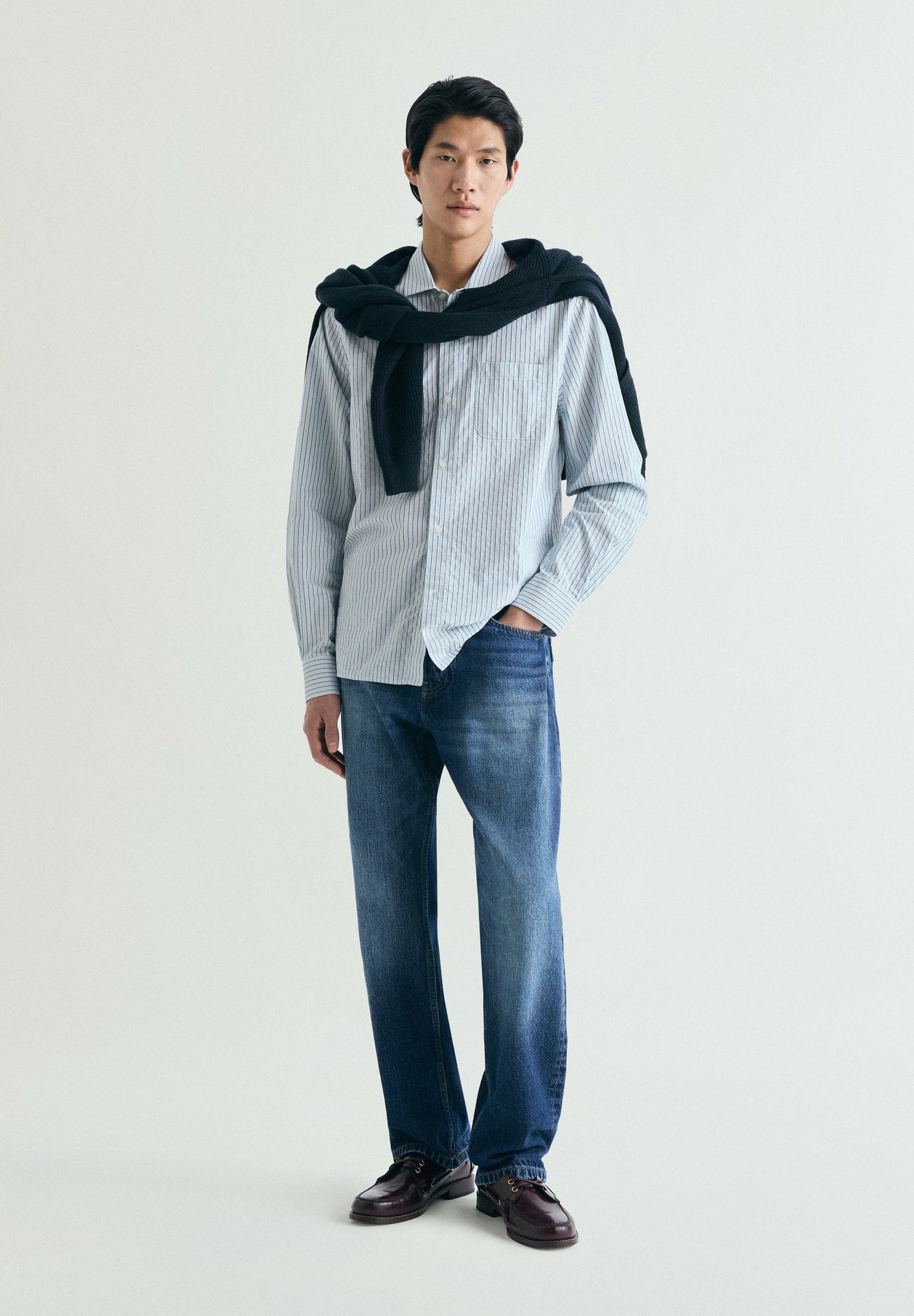 CAMISA ÀS RISCAS COM BOLSO