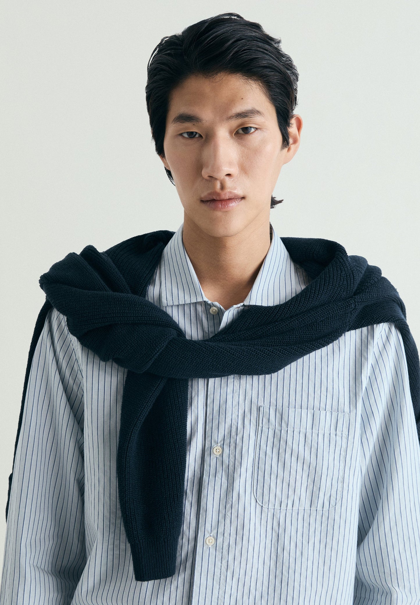 CAMISA ÀS RISCAS COM BOLSO