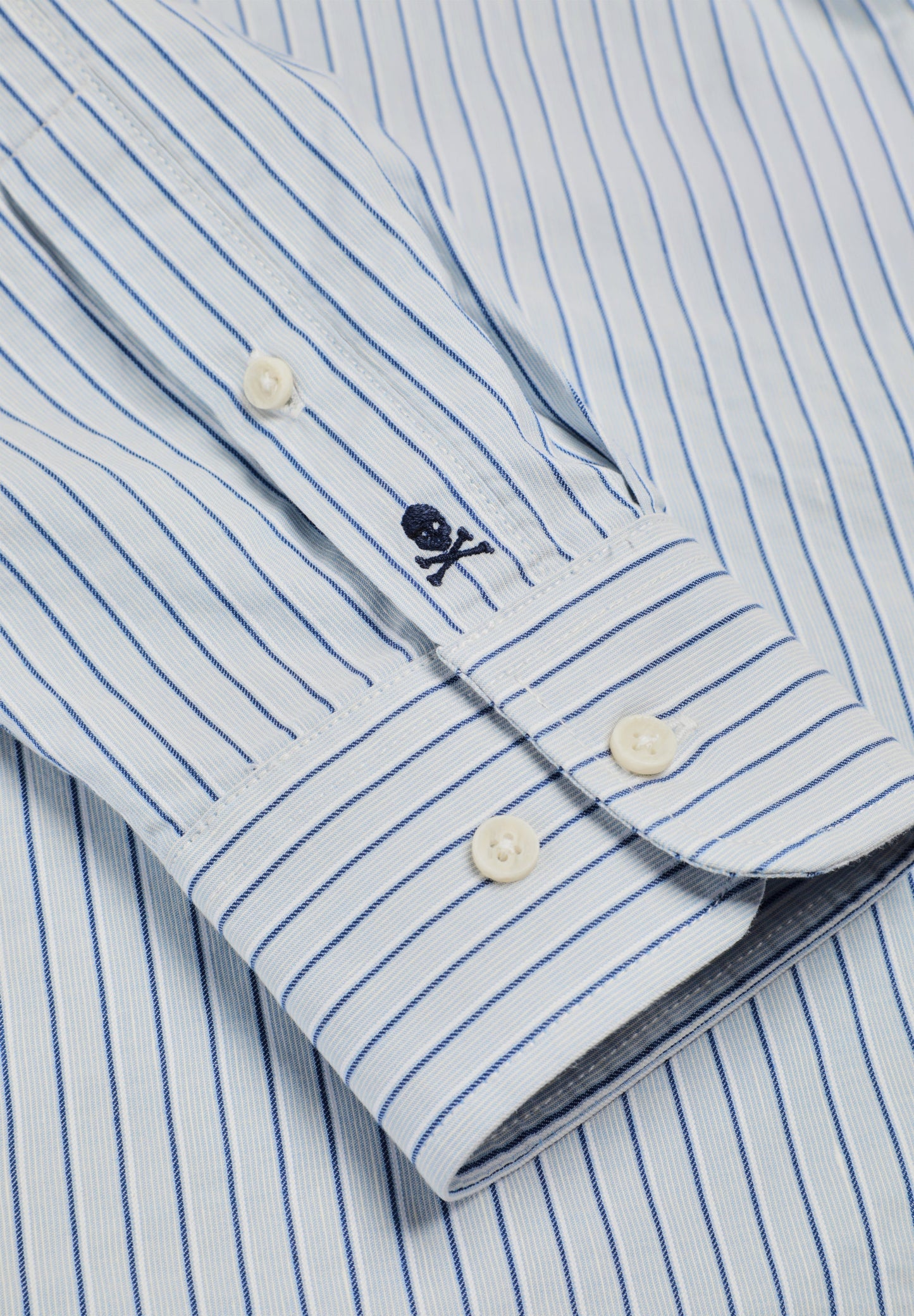 CAMISA ÀS RISCAS COM BOLSO