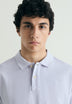 CAMISA POLO DE PIQUÉ COM BORDADO