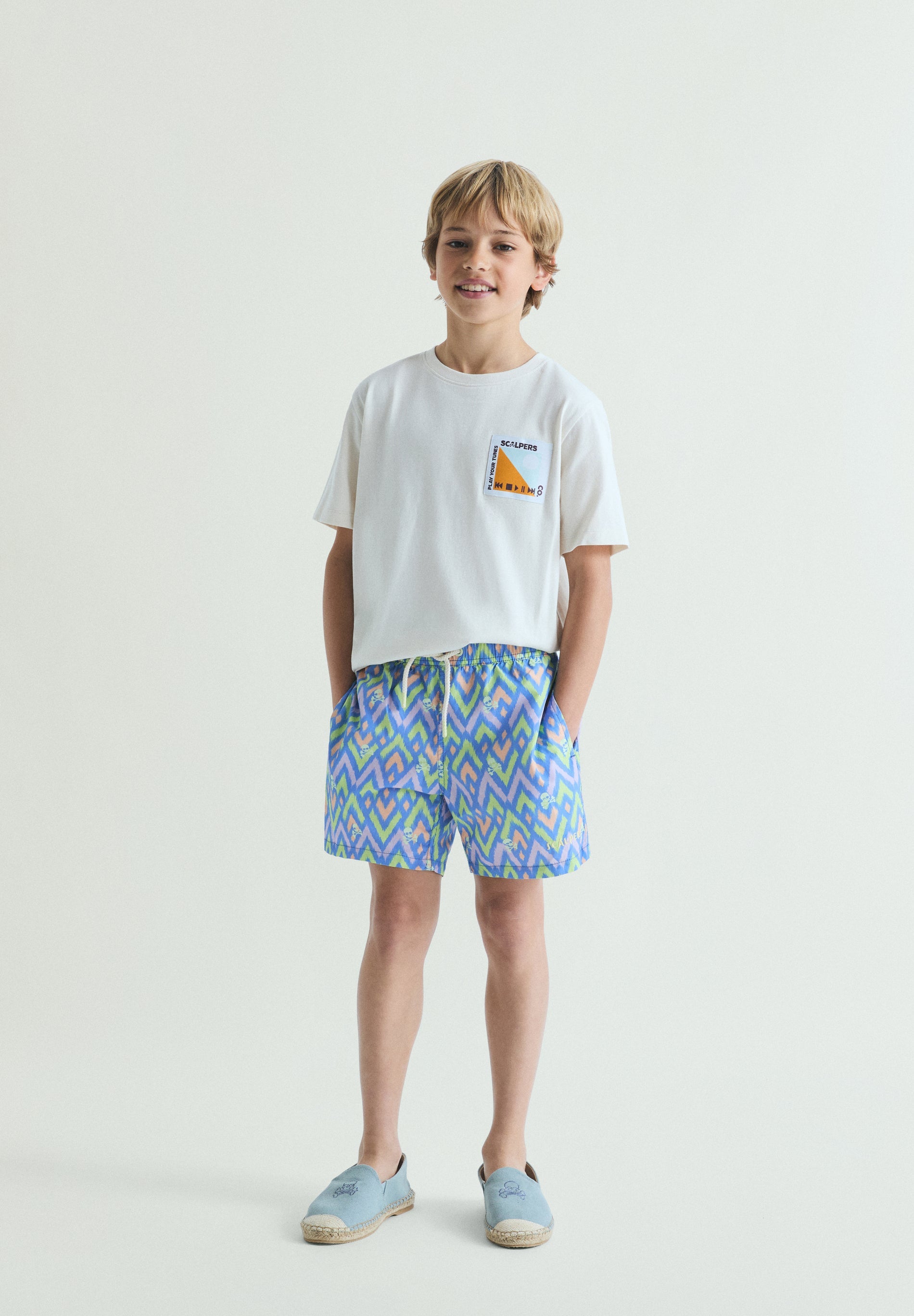 CALÇÕES DE BANHO COM ESTAMPADO DE IKAT