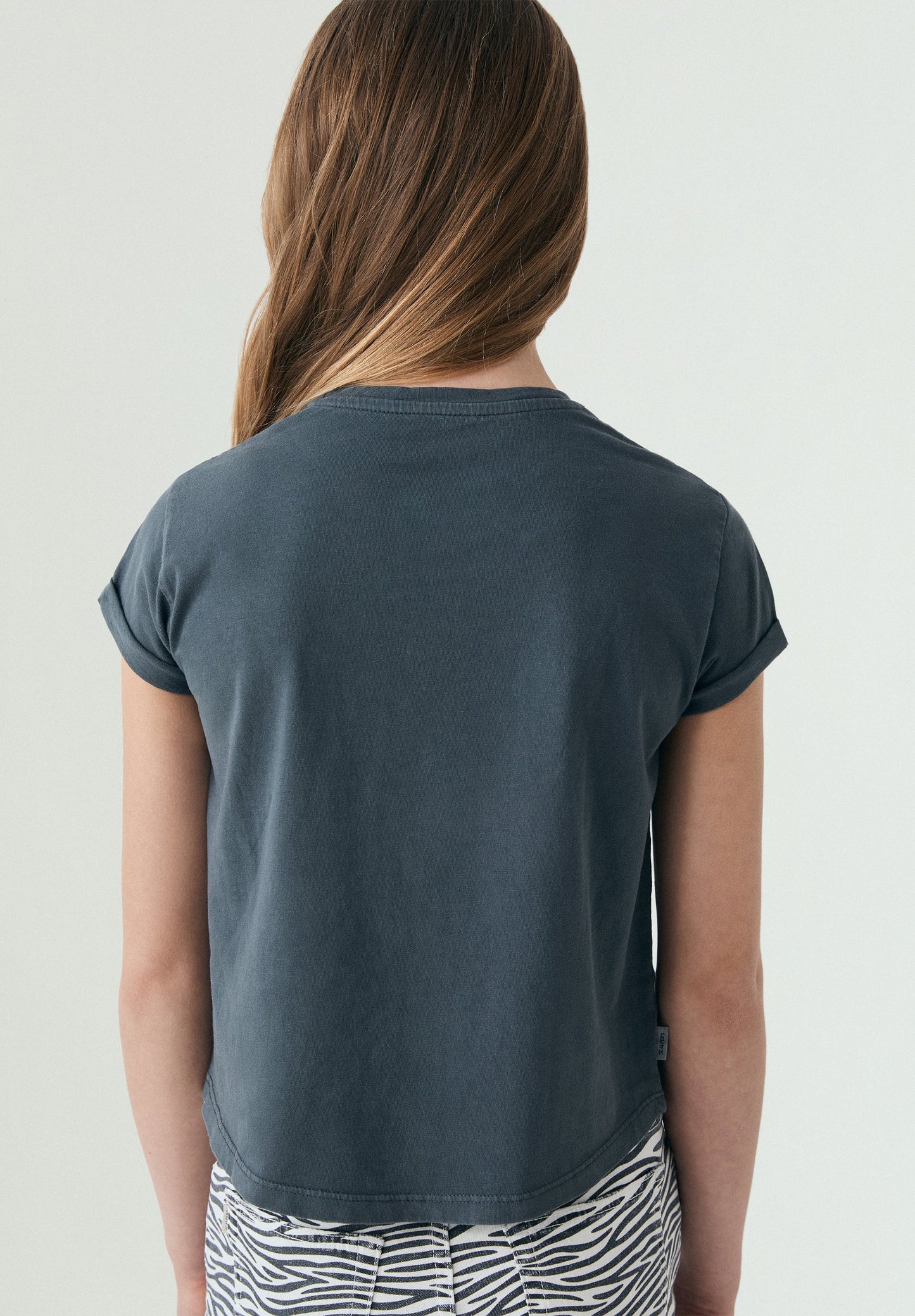 T-SHIRT COM SKULL EM ESTAMPADO ANIMAL