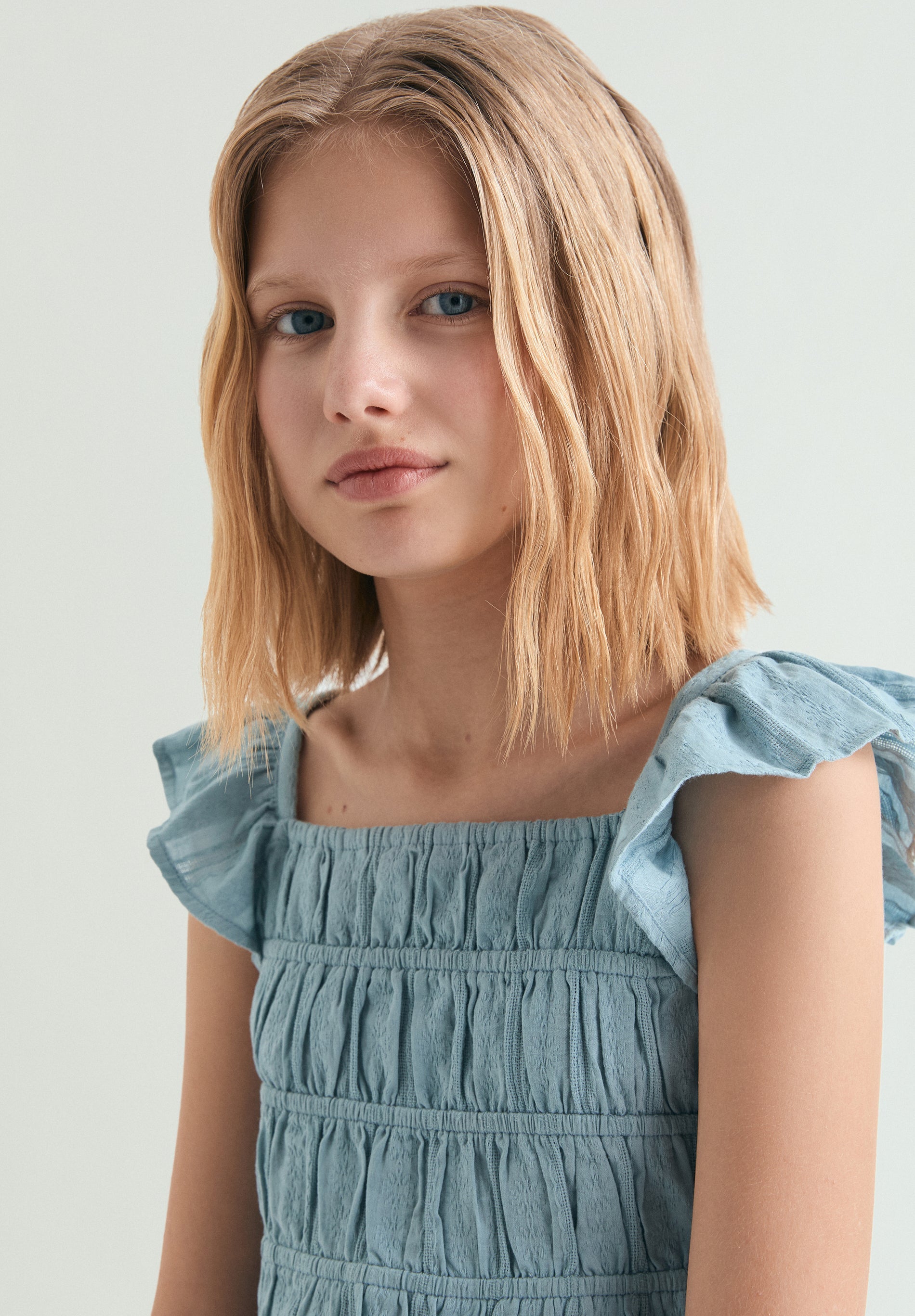 BLUSA COM FOLHOS FRANZIDA