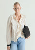 BLUSA DE ALGODÃO COM FOLHOS