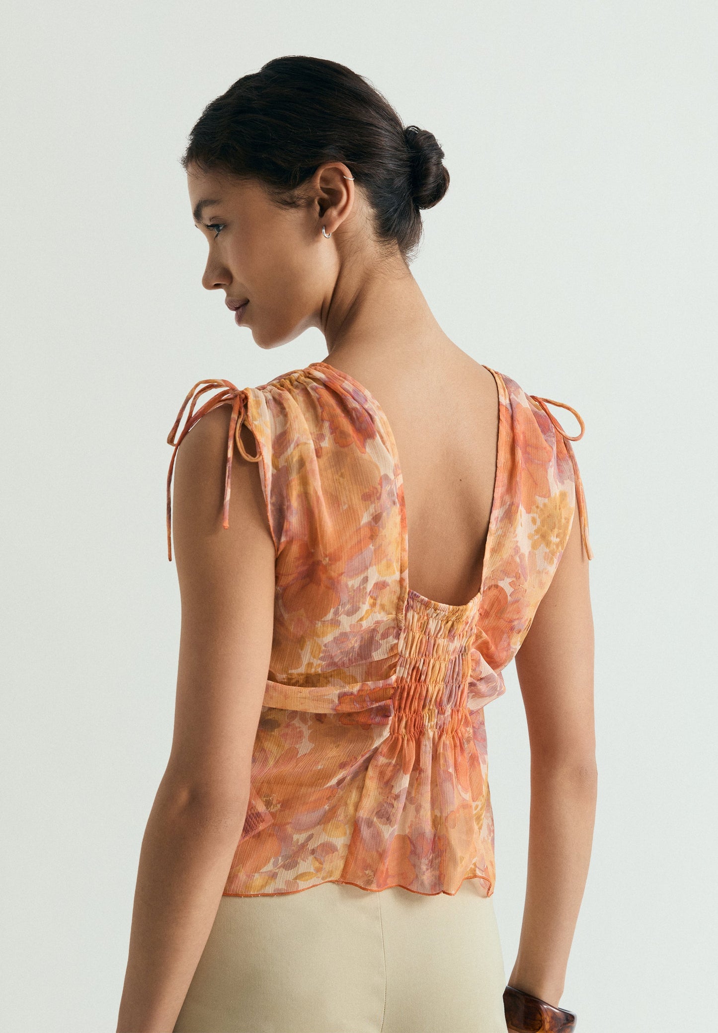 BLUSA COM FRANZIDOS FLORAL
