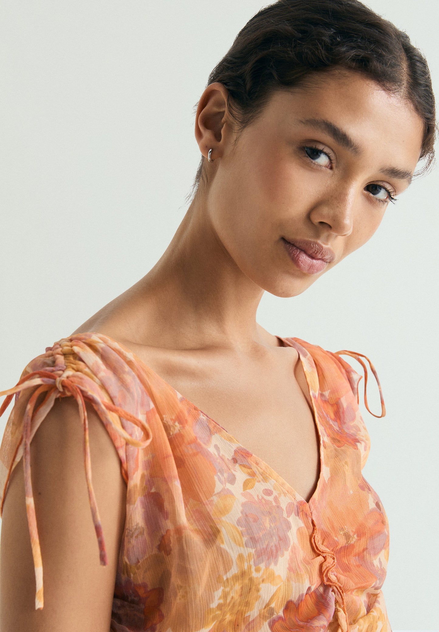 BLUSA COM FRANZIDOS FLORAL