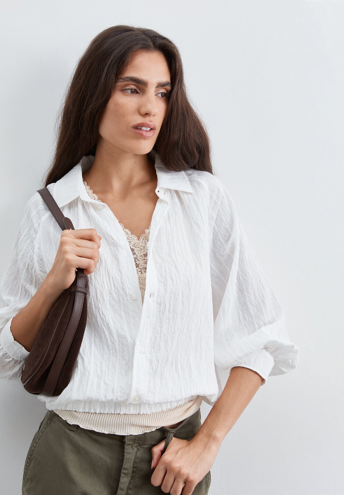 BLUSA FLUIDA ÀS RISCAS