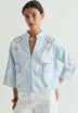 CAMISA COM PORMENORES BORDADOS