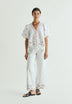 JEANS WIDE LEG COM BORDADOS FLORAIS