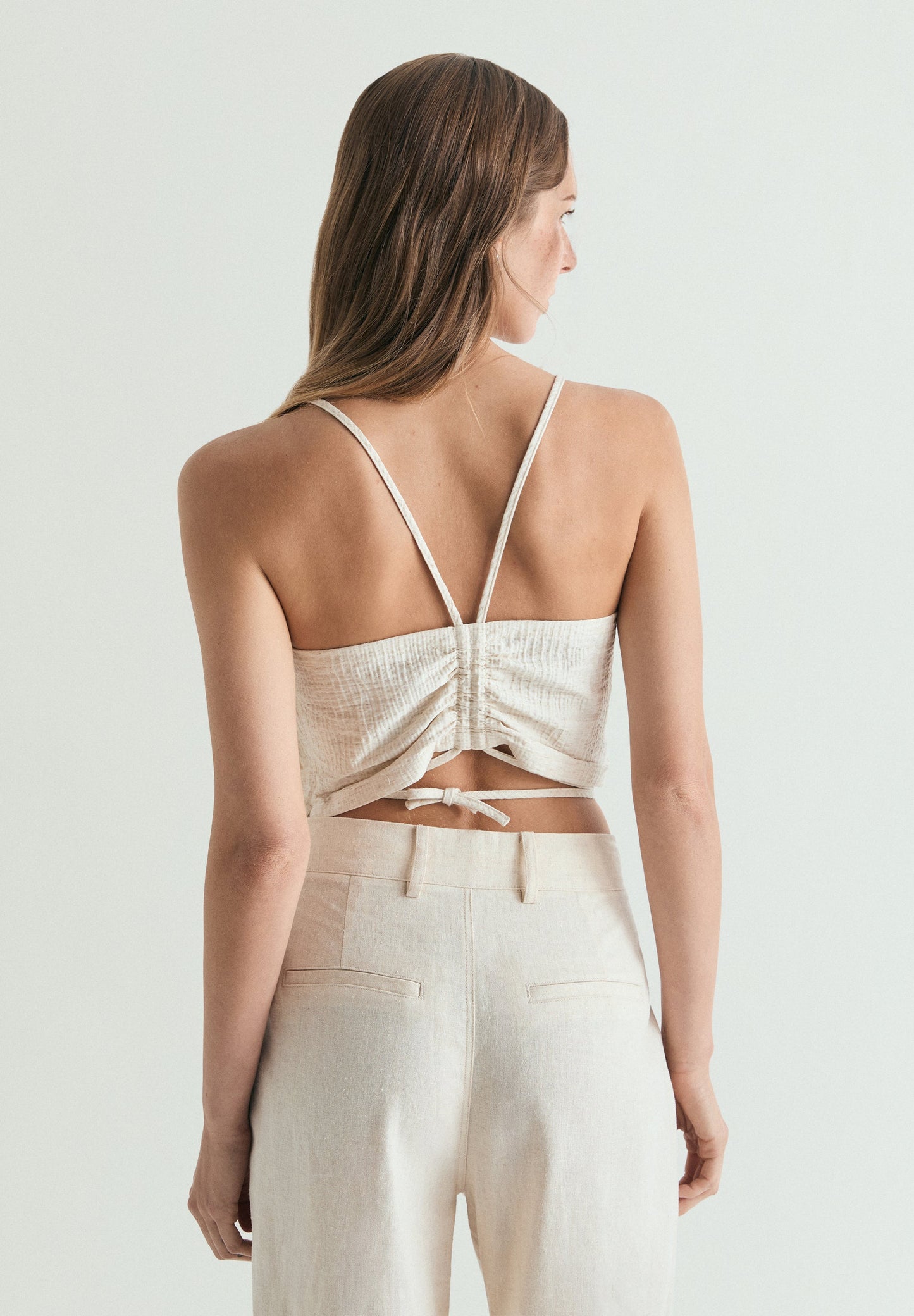 TOP COM PORMENOR FLORAL