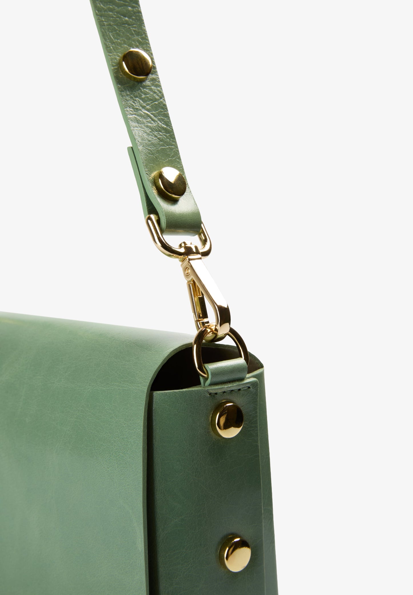 BOLSA MINI EM PELE COM TACHAS